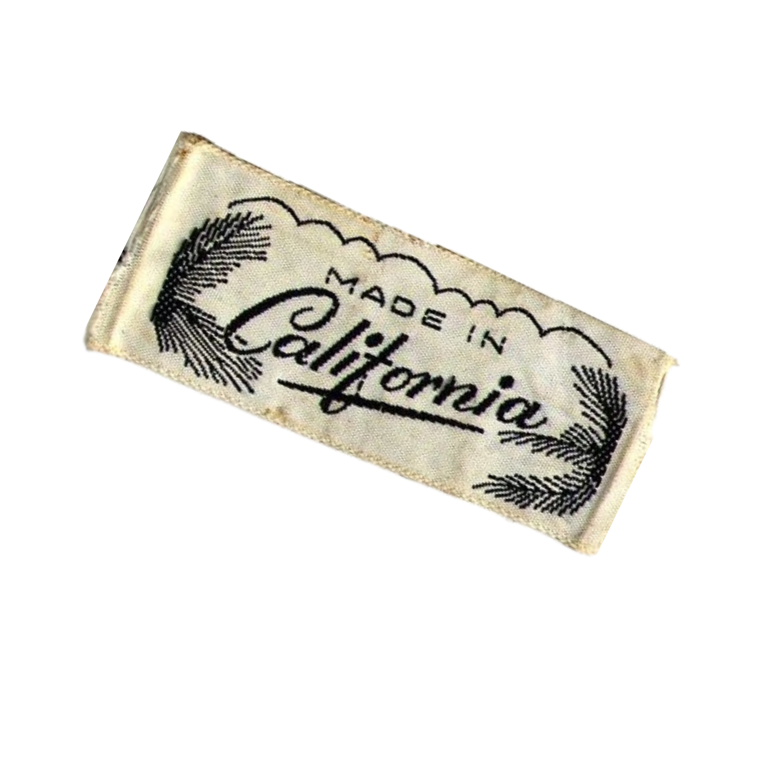 Close-up of a California state patch with an embroidered design, showing the words 'Made in California' with decorative greenery above and below.