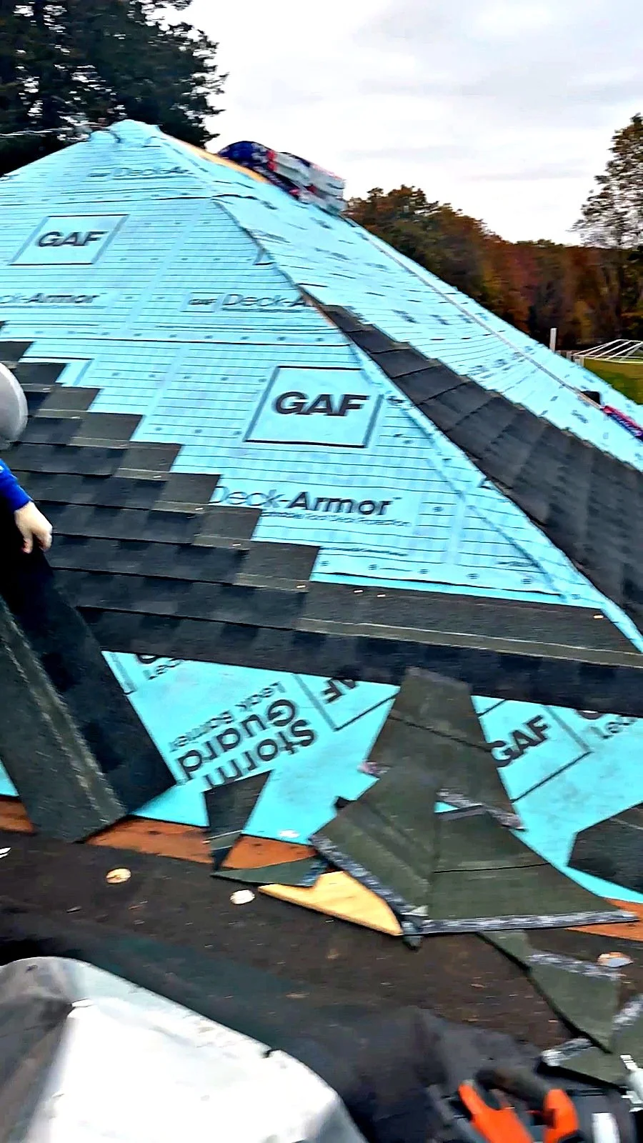 Residential roof replacement in progress on a Raimo Renovations job - GAF underlayment and a new pipe boot flashing detail