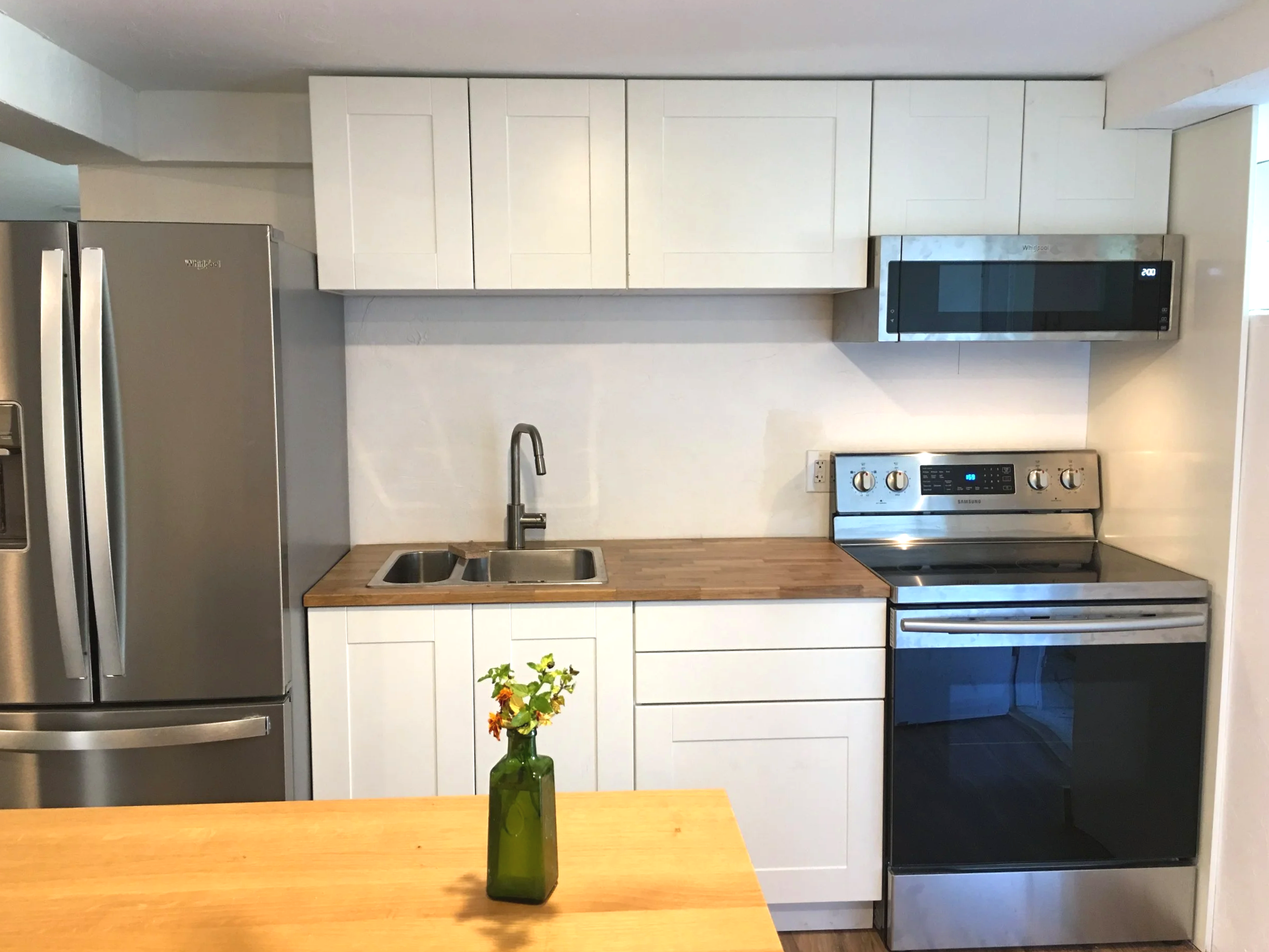 Kitchen installation to convert daylight basement into an ADU.
