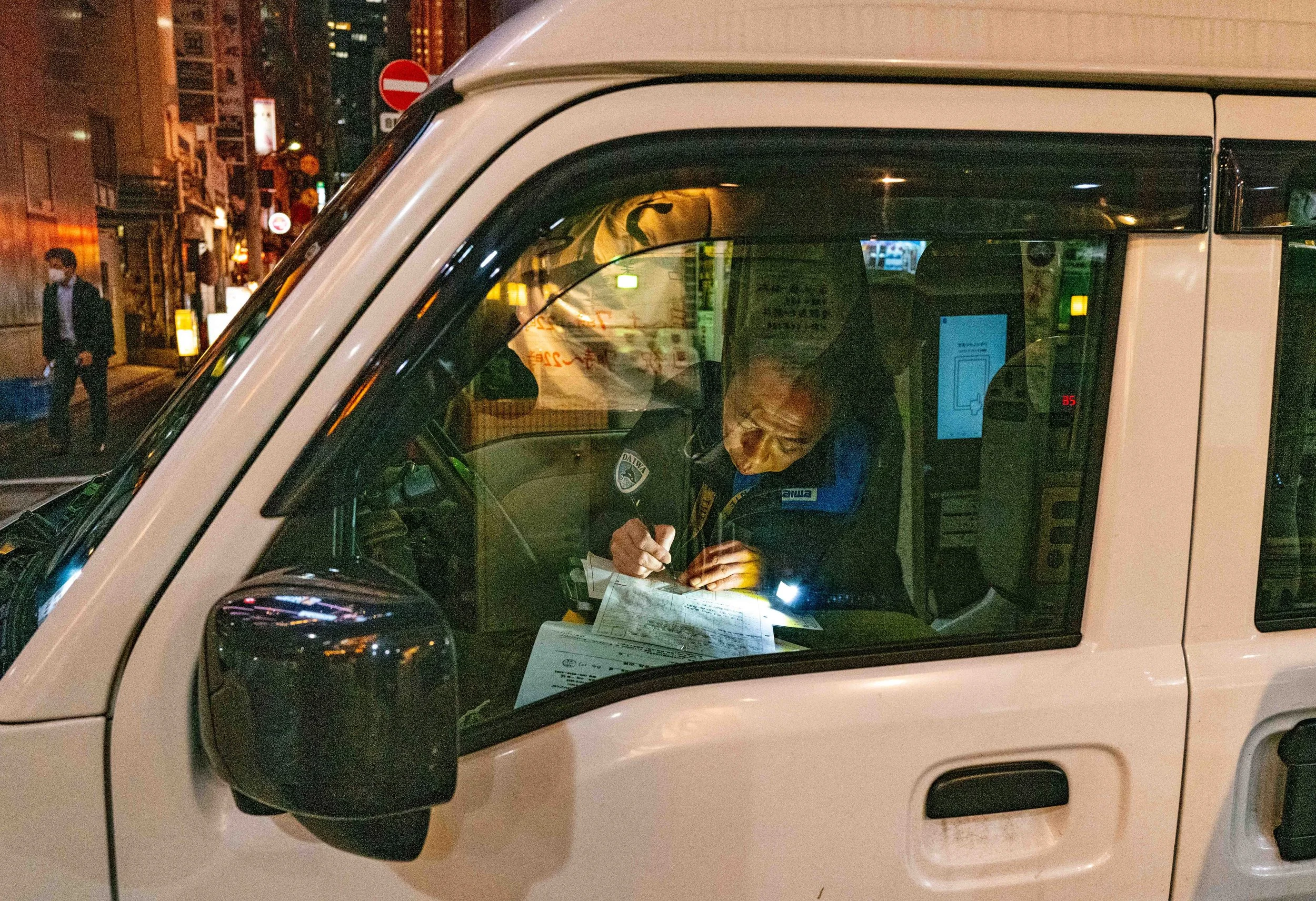 Tokyo man writing Q2 .jpg