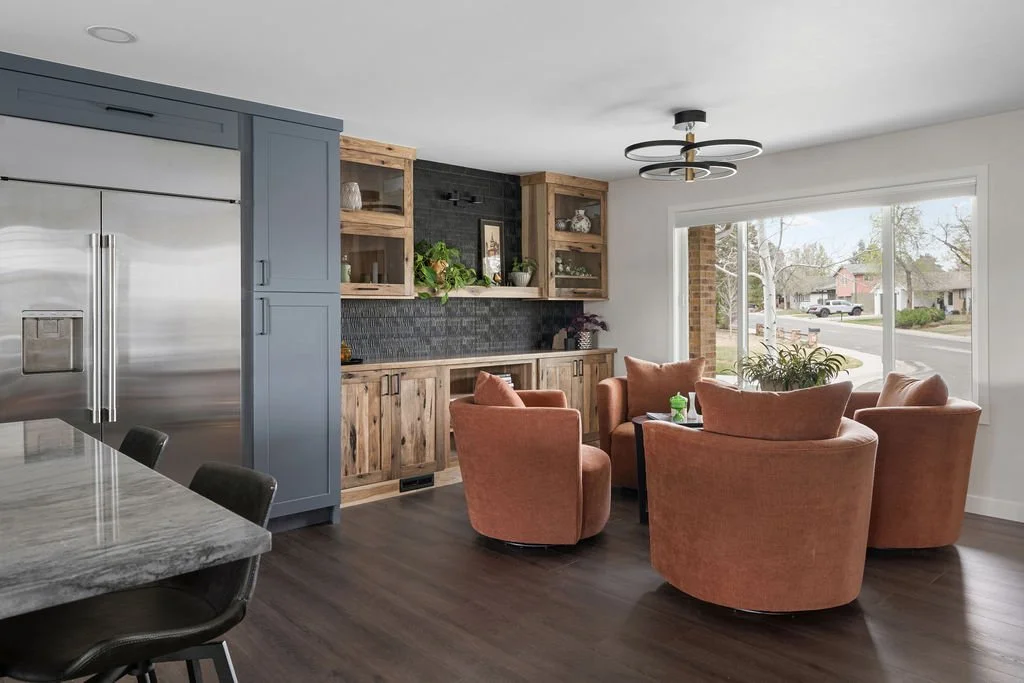 Contemporary open-concept living area with custom built-ins, rich textures, and thoughtfully designed spaces for relaxing and hosting guests.