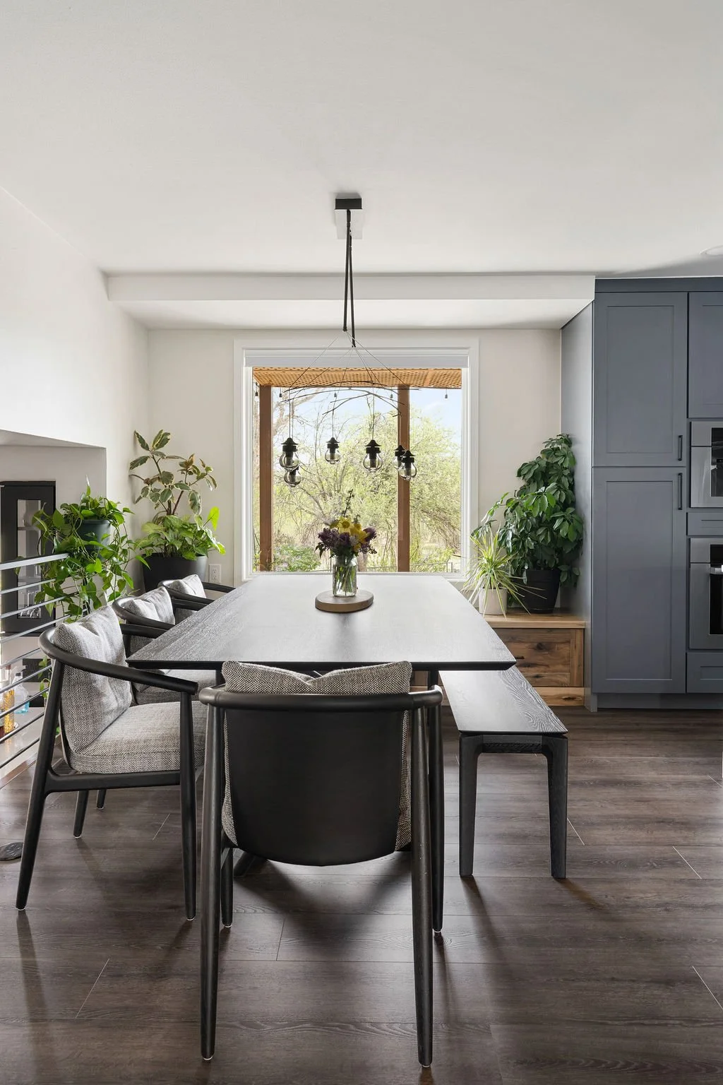 Elegant open-concept dining space blending modern finishes, functional design, and comfortable seating for family living.