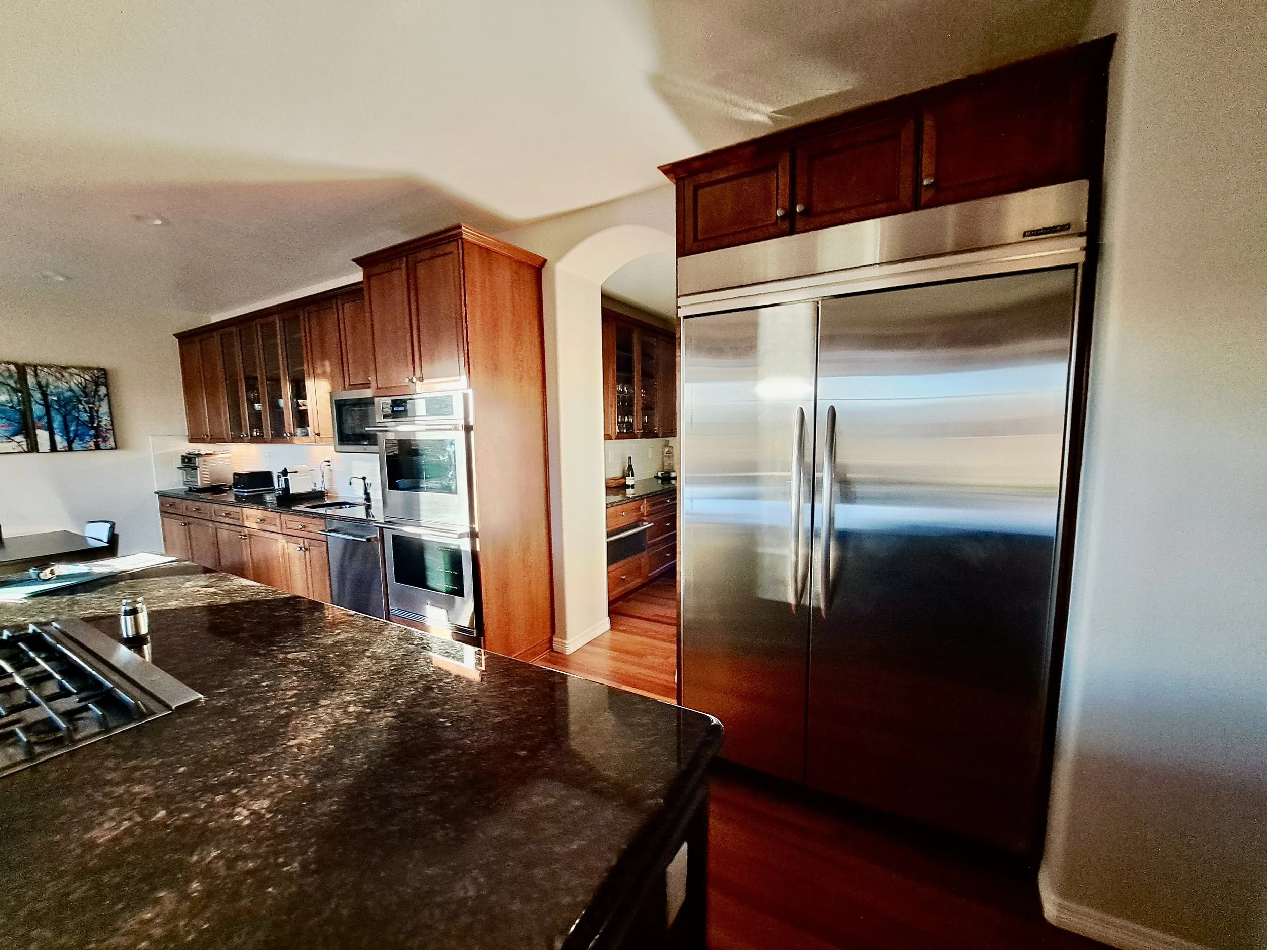 Original appliance and cabinetry layout before Highlands Ranch kitchen renovation