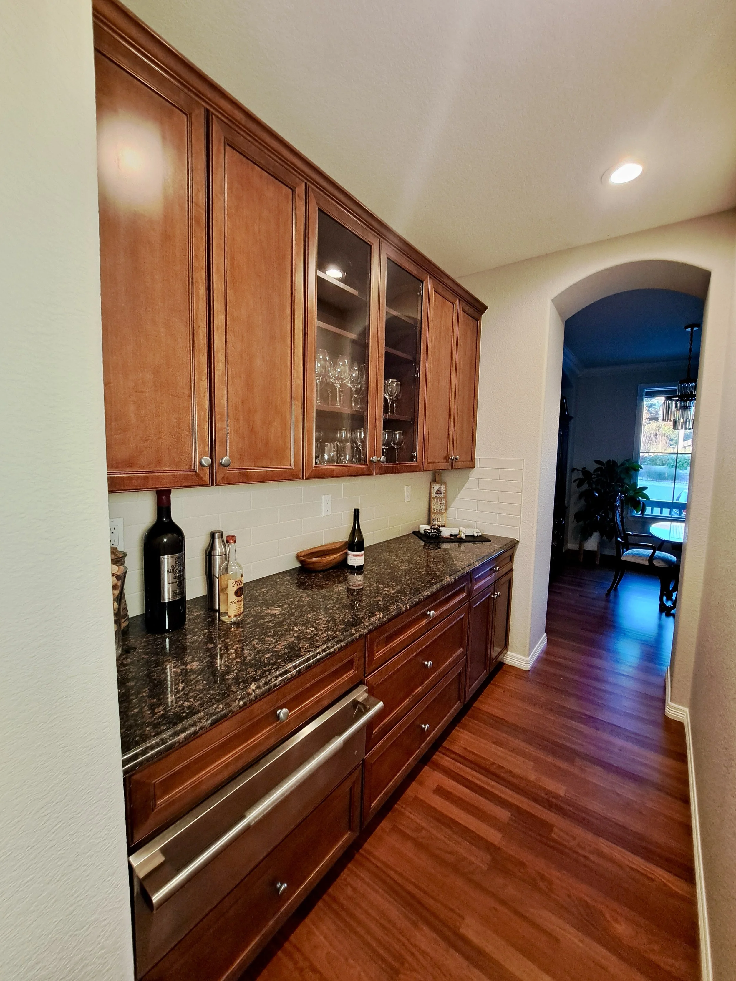 Original cherry cabinetry before warm wood kitchen remodel in Highlands Ranch