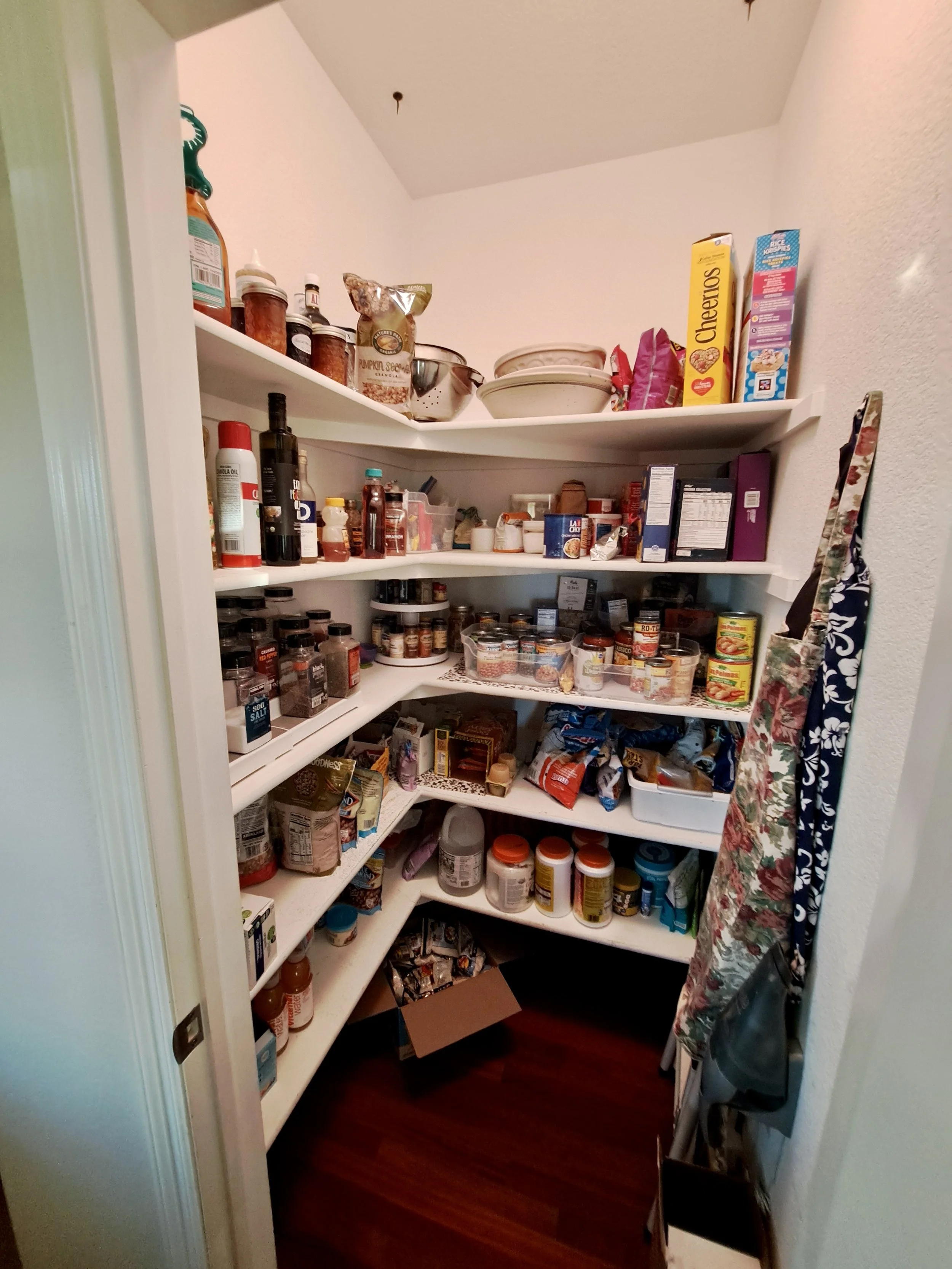 Original pantry storage before Highlands Ranch kitchen remodel