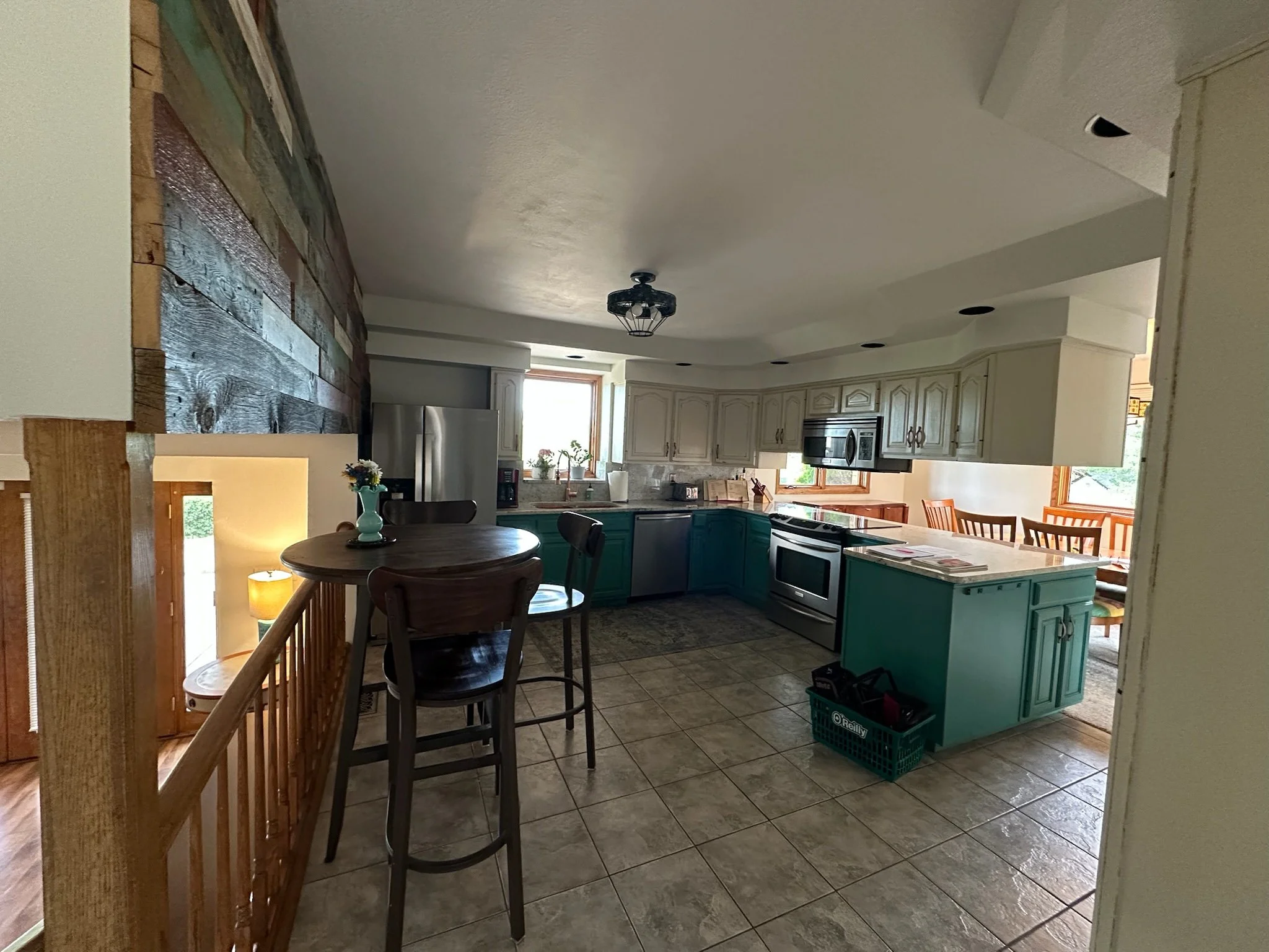 Original kitchen layout before open-concept remodel in Arvada, Colorado