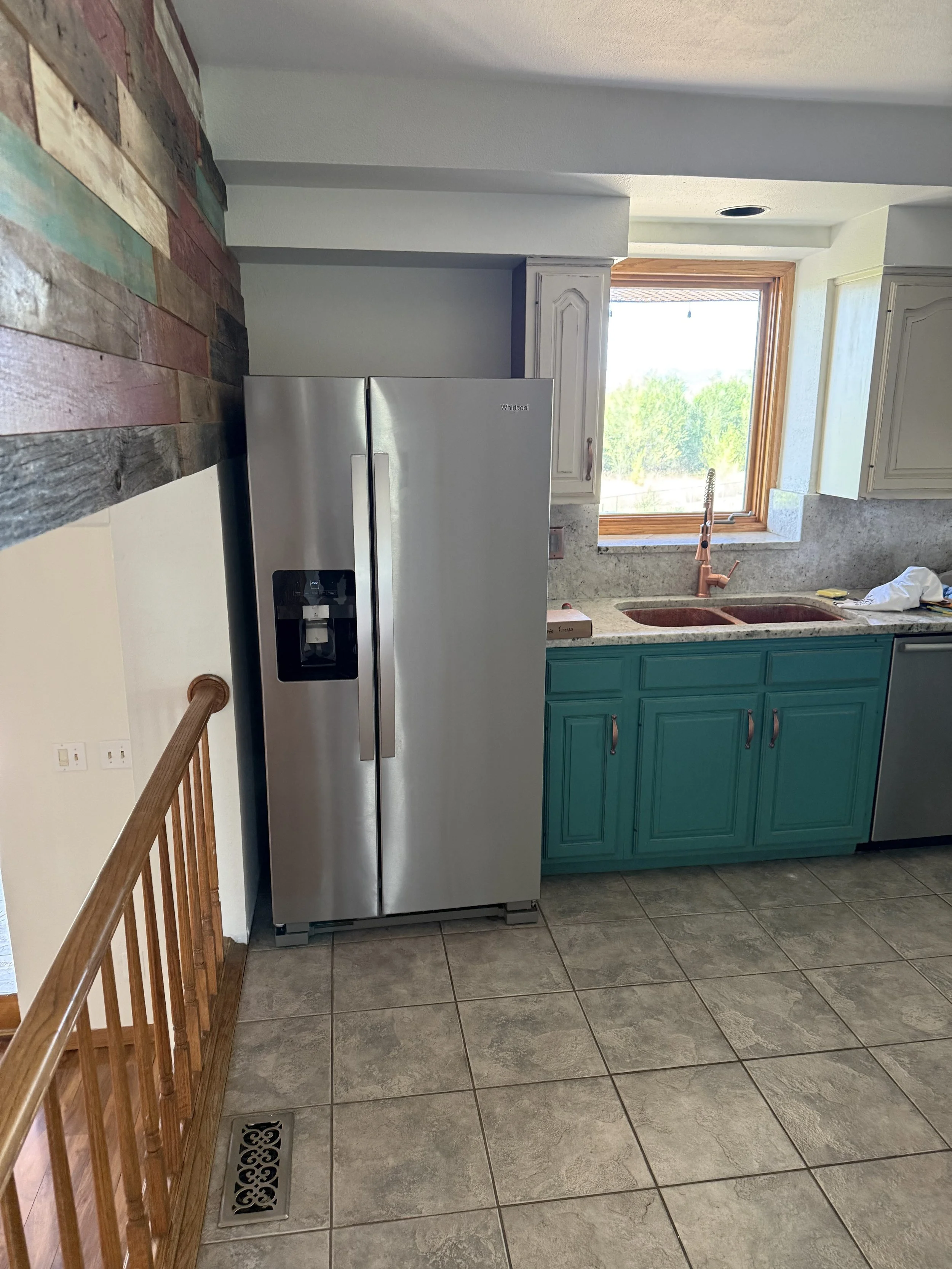 Arvada kitchen before renovation with original cabinets, flooring and appliances