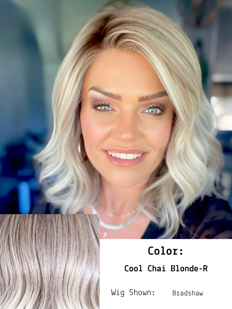 Cool Chai Blonde-R shown in Bradshaw worn by Brandi. This versatile color complements various skin tones, offering a balanced coolness that brightens the complexion without appearing too warm. The subtle interplay between cool blonde lengths and the 
