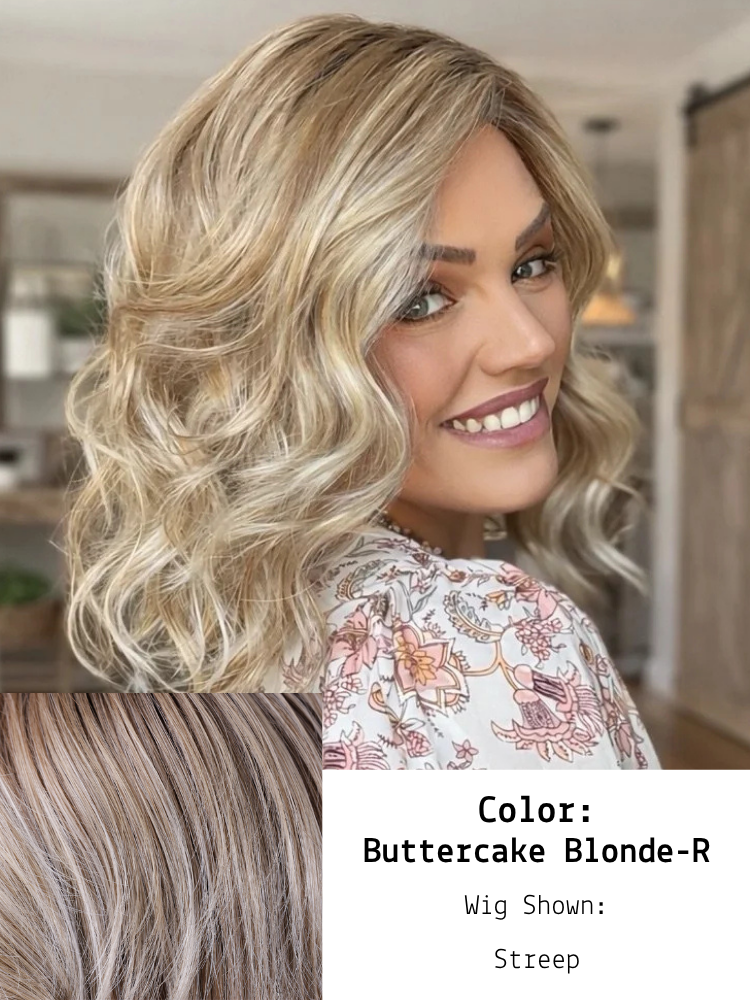 Buttercake Blonde-R in Streep shown on Brandi.  This shade features a neutral to warm blend, combining tones of light brown (10), medium ash blonde (23), and lightest blonde (88), with darker roots (8). The result is a harmonious mix that offers dept