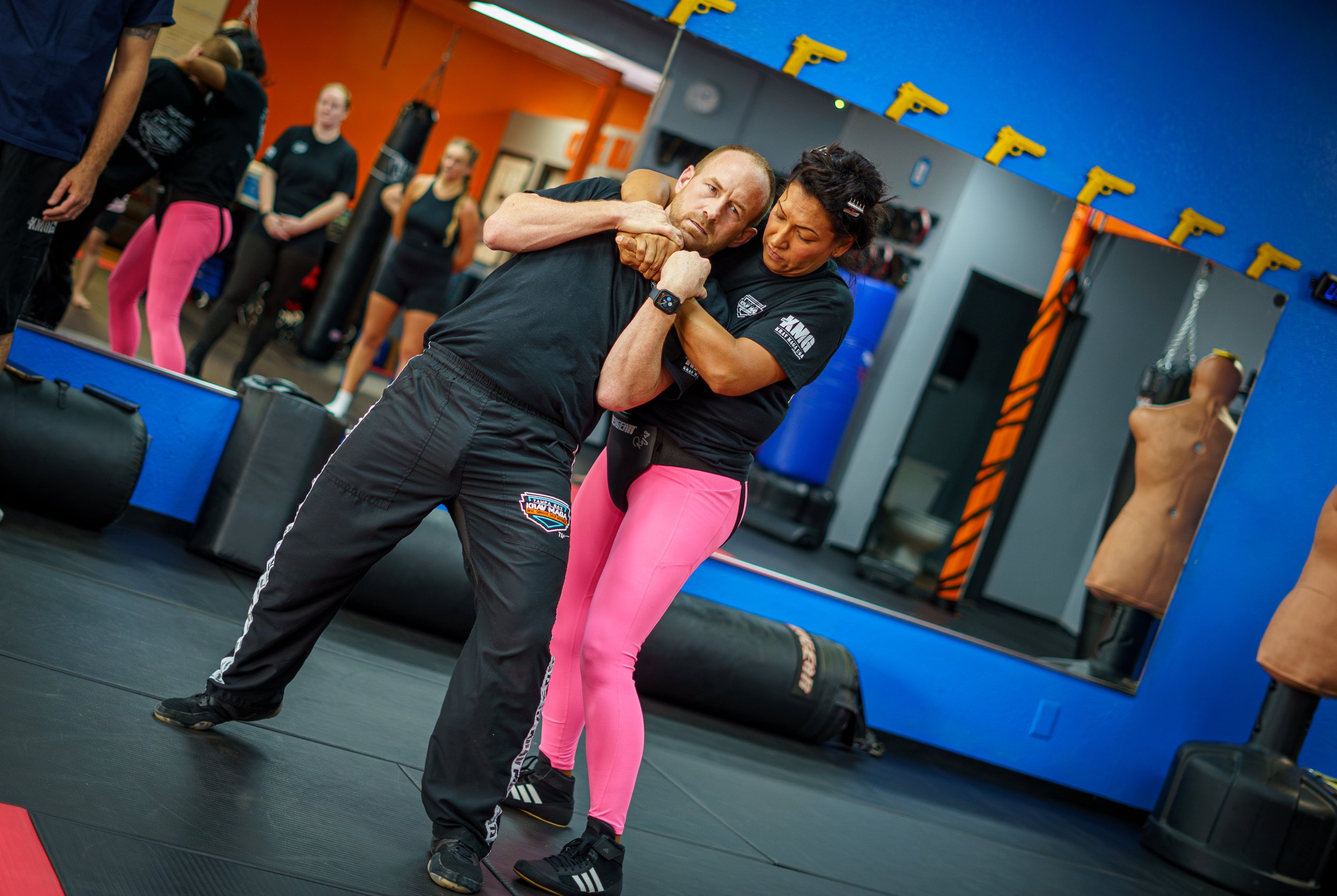 Real-world Krav Maga self-defense training in Clearwater, FL — this photo captures students practicing choke defense techniques at Tampa Bay Krav Maga, emphasizing practical application and focused instruction.