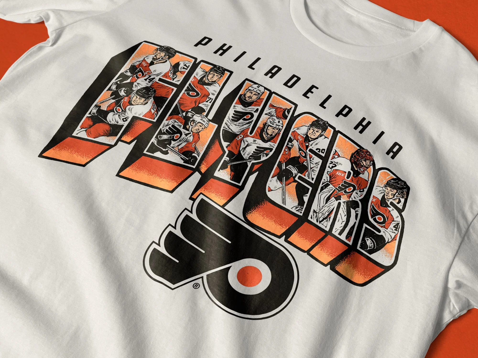 White T-shirt with a graphic design featuring illustrations of hockey players in orange, black, and white, with the word 'PHILADELPHIA' printed above the images.