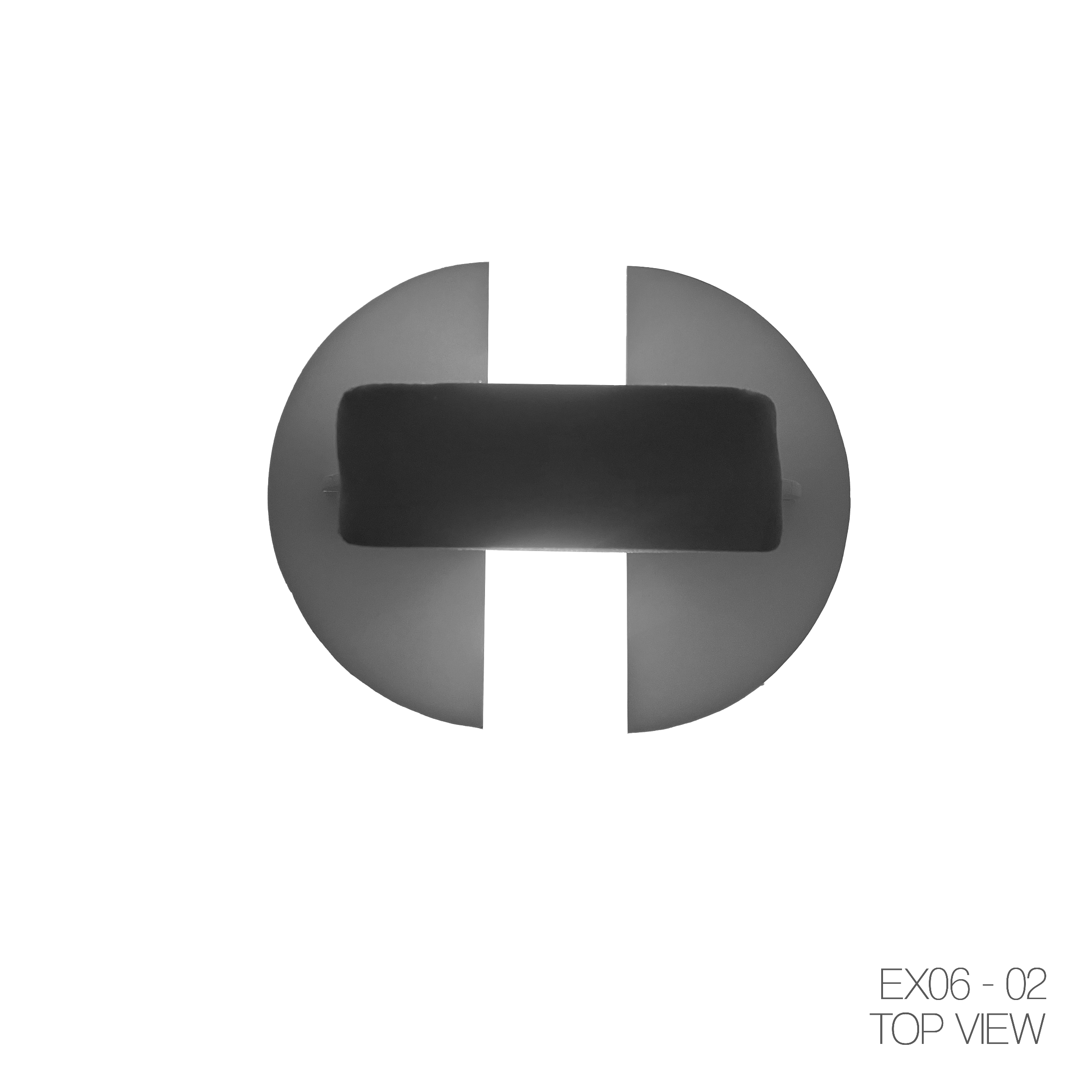 Top view of a round, black object with a rectangular handle on top, centered inside a white circular frame, with the text 'EX06 - 02 TOP VIEW' in the bottom right corner.