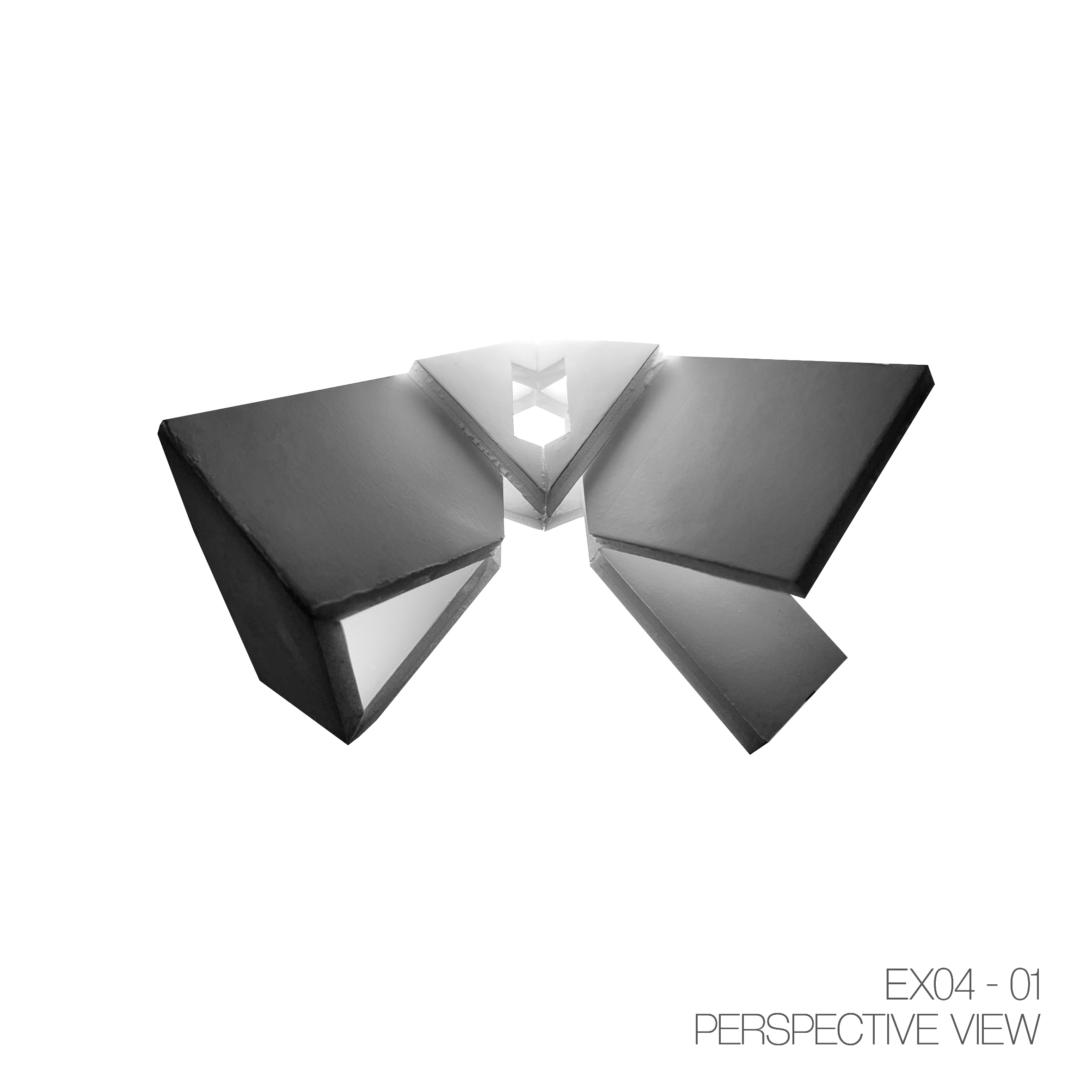 Black and white architectural model of a building viewed from a perspective angle with a triangular shape at the top center. The model appears to be made of paper or cardboard with visible edges and clean lines. Text at the bottom right indicates it 