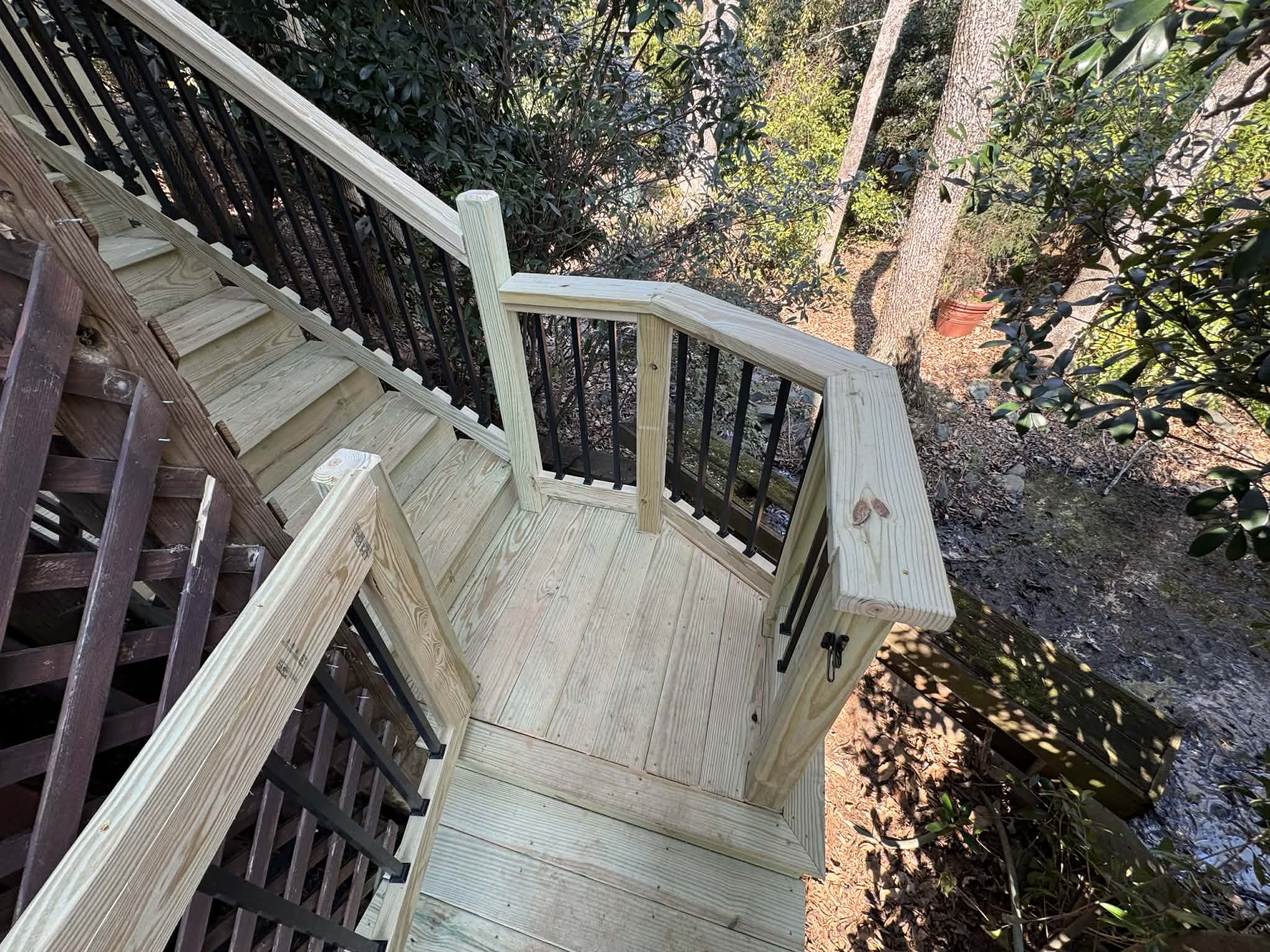 Elevated stairway with platform and railings