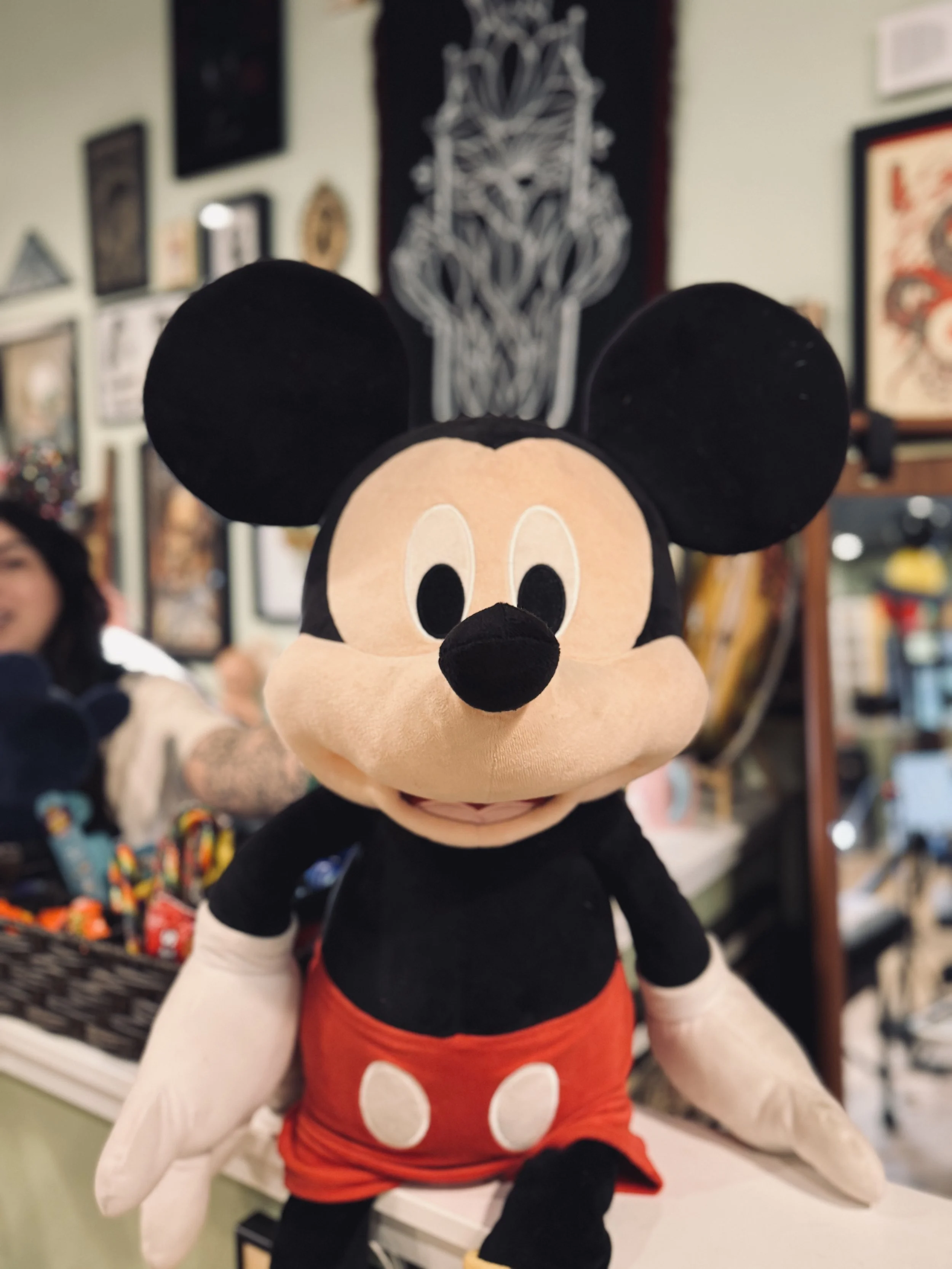 Large Mickey plush on the counter at Colby Ave.