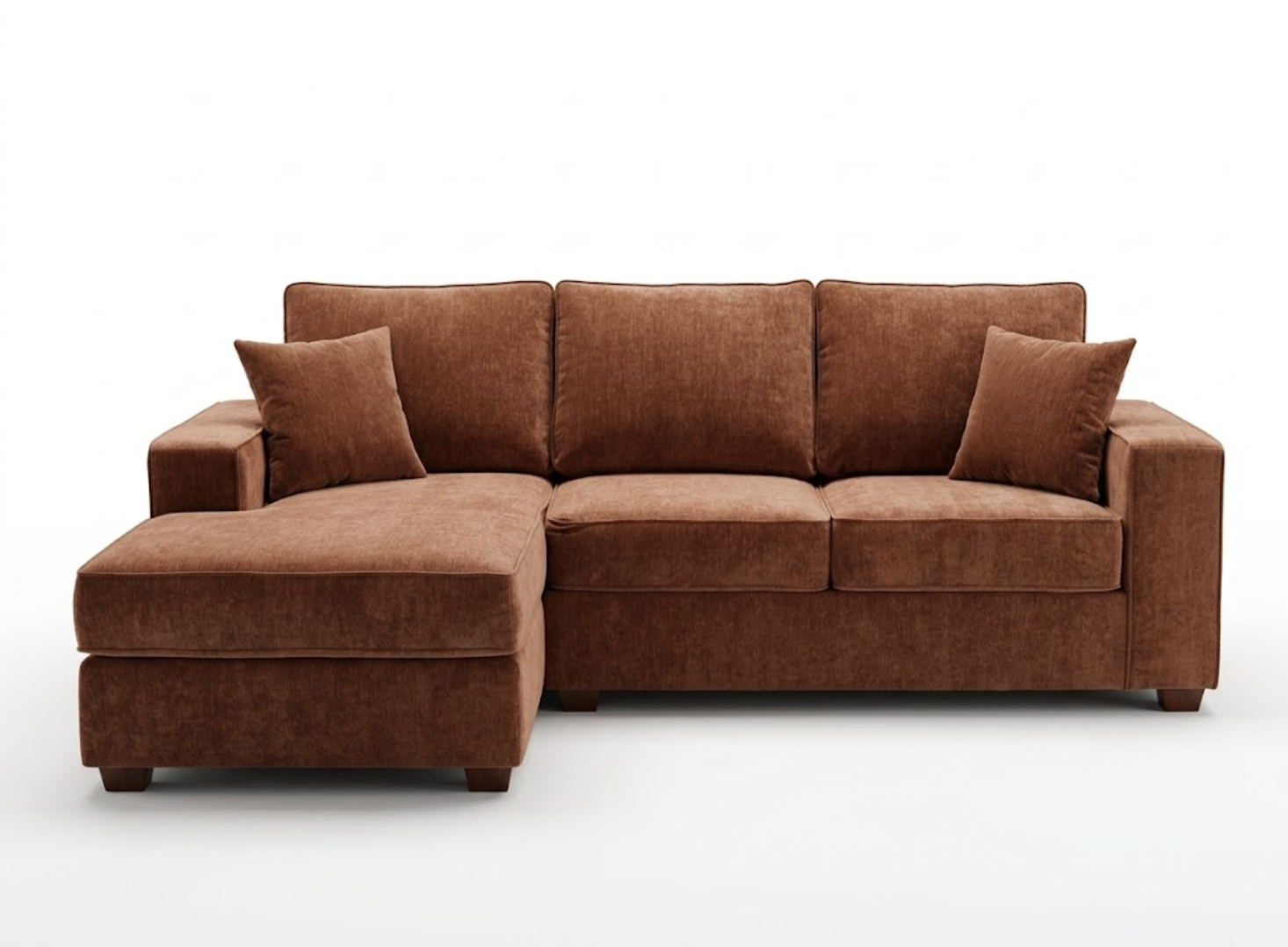Brown sectional sofa with pillows on a white background.