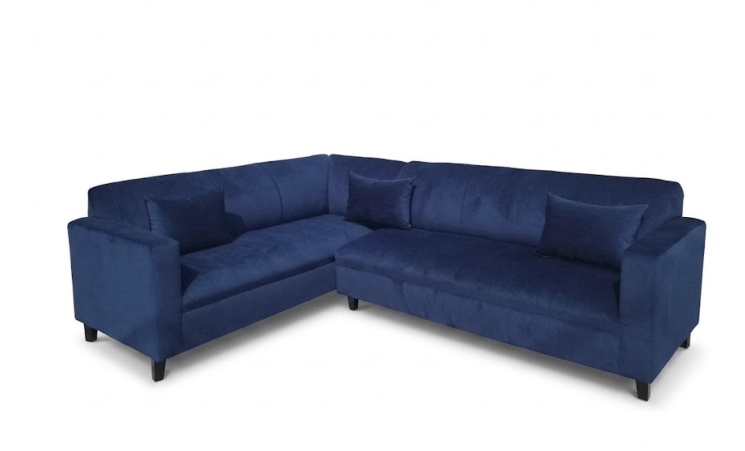 A blue, L-shaped sectional sofa with matching cushions on a white background.