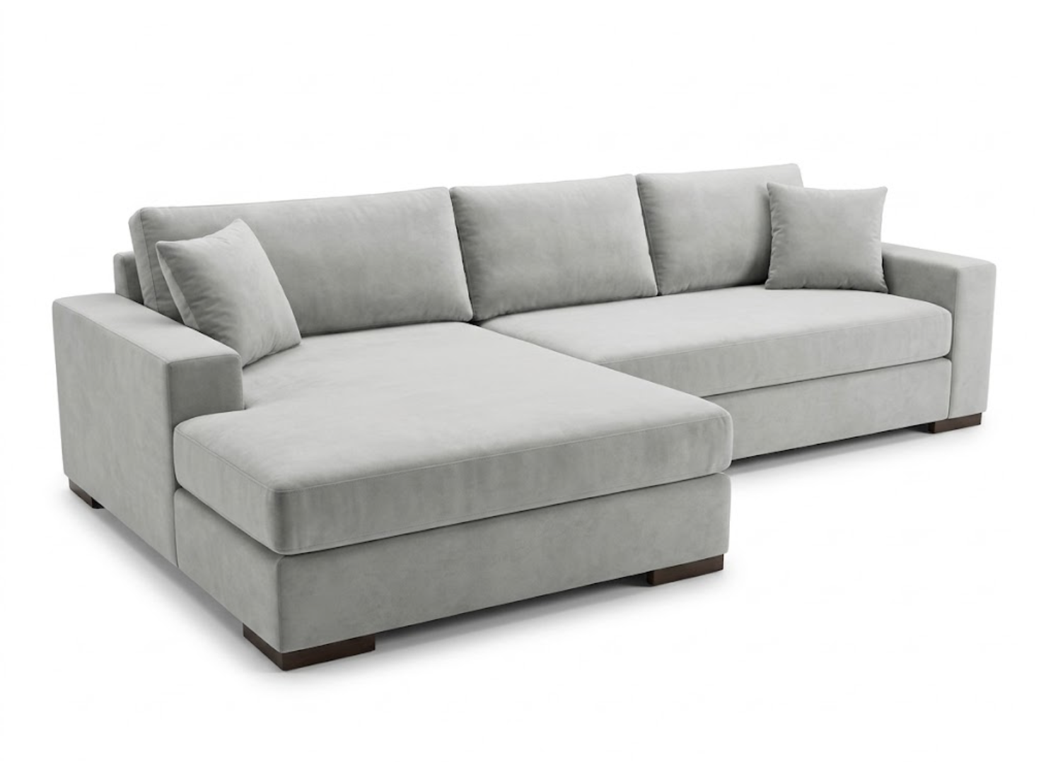 Light gray sectional sofa with matching cushions on a white background.
