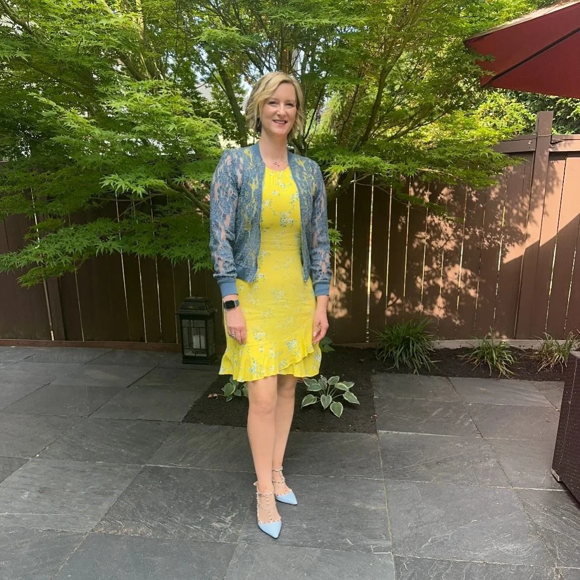 Sunshine meets street style. Our stylist Pamela takes the fit-and-flare out of garden party territory and into “yes, I have somewhere fabulous to be.” The lace bomber and studded heels keep it from feeling too sweet, proving that even the