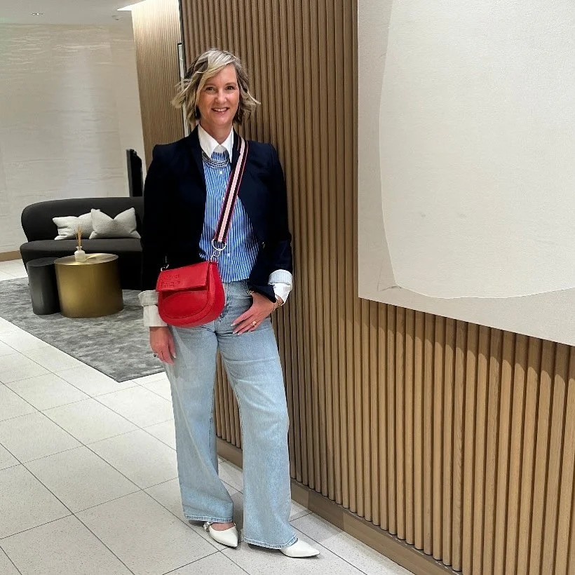 Primary instincts.

Blues, whites, and a perfect pop of red; proof that polished doesn&rsquo;t have to mean predictable.

Our stylist Pamela takes her classic striped shirt out again, this time with a blue blazer, light denim, white flats, and a cros