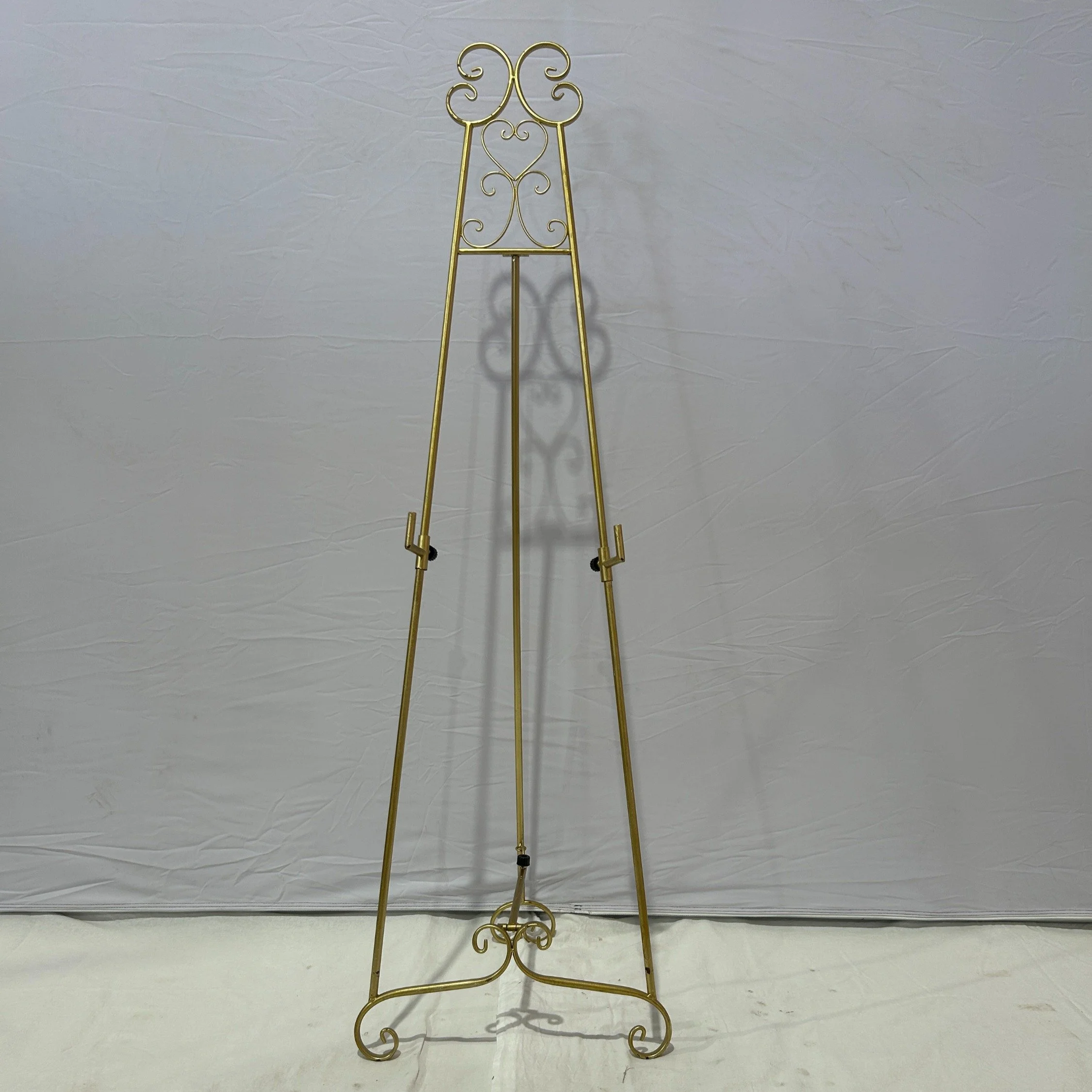 gold ornate easel.jpg