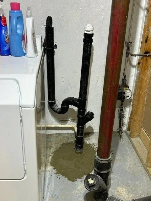 Plumber repairing a laundry drain line to restore proper water flow and prevent leaks. Professional drain line repair keeps laundry rooms safe, efficient, and free from water damage.