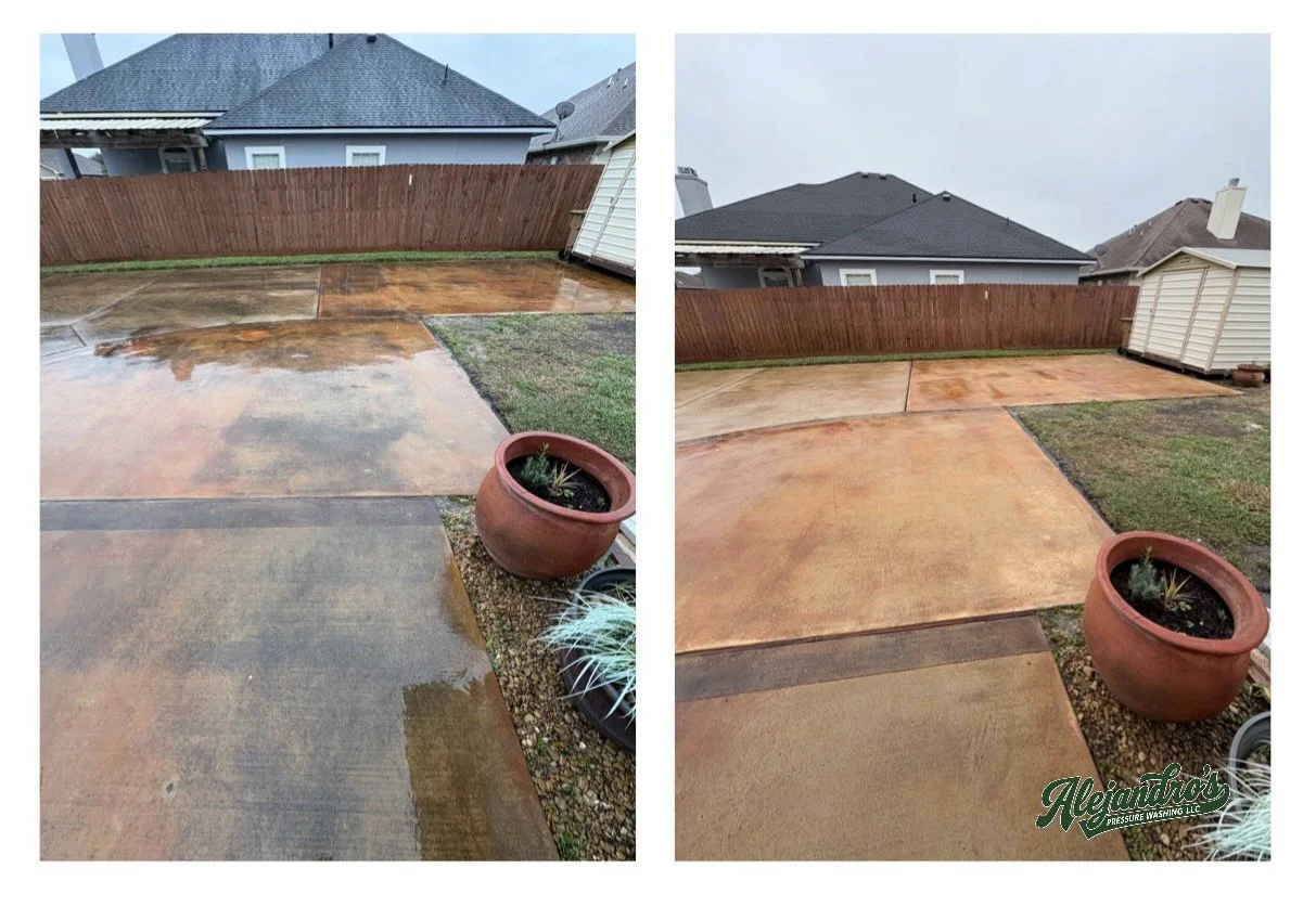 Comparison of a wet and clean concrete patio in a backyard, showing a before and after pressure washing, with a wooden fence and neighboring houses in the background.