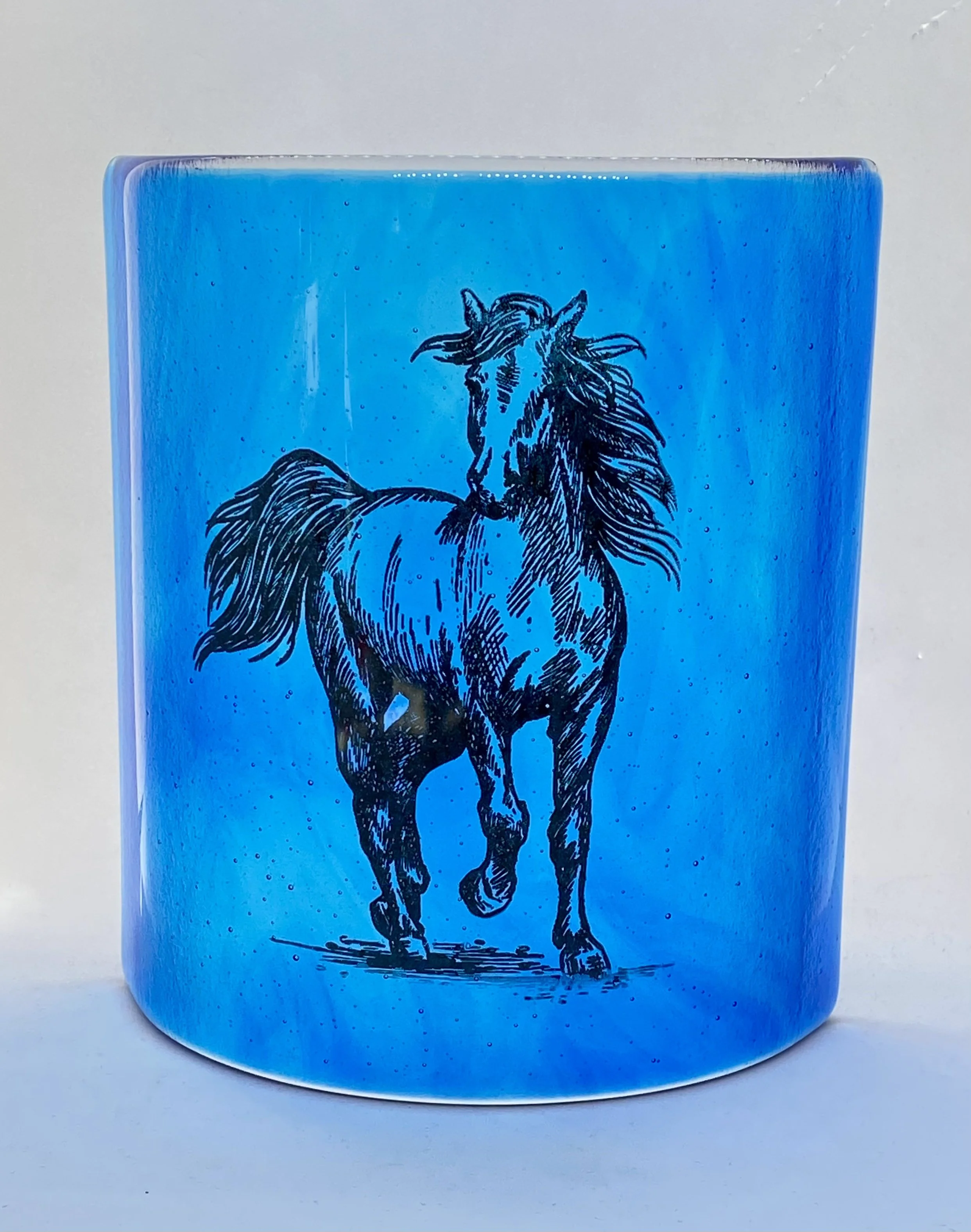 Galloping horse on blue