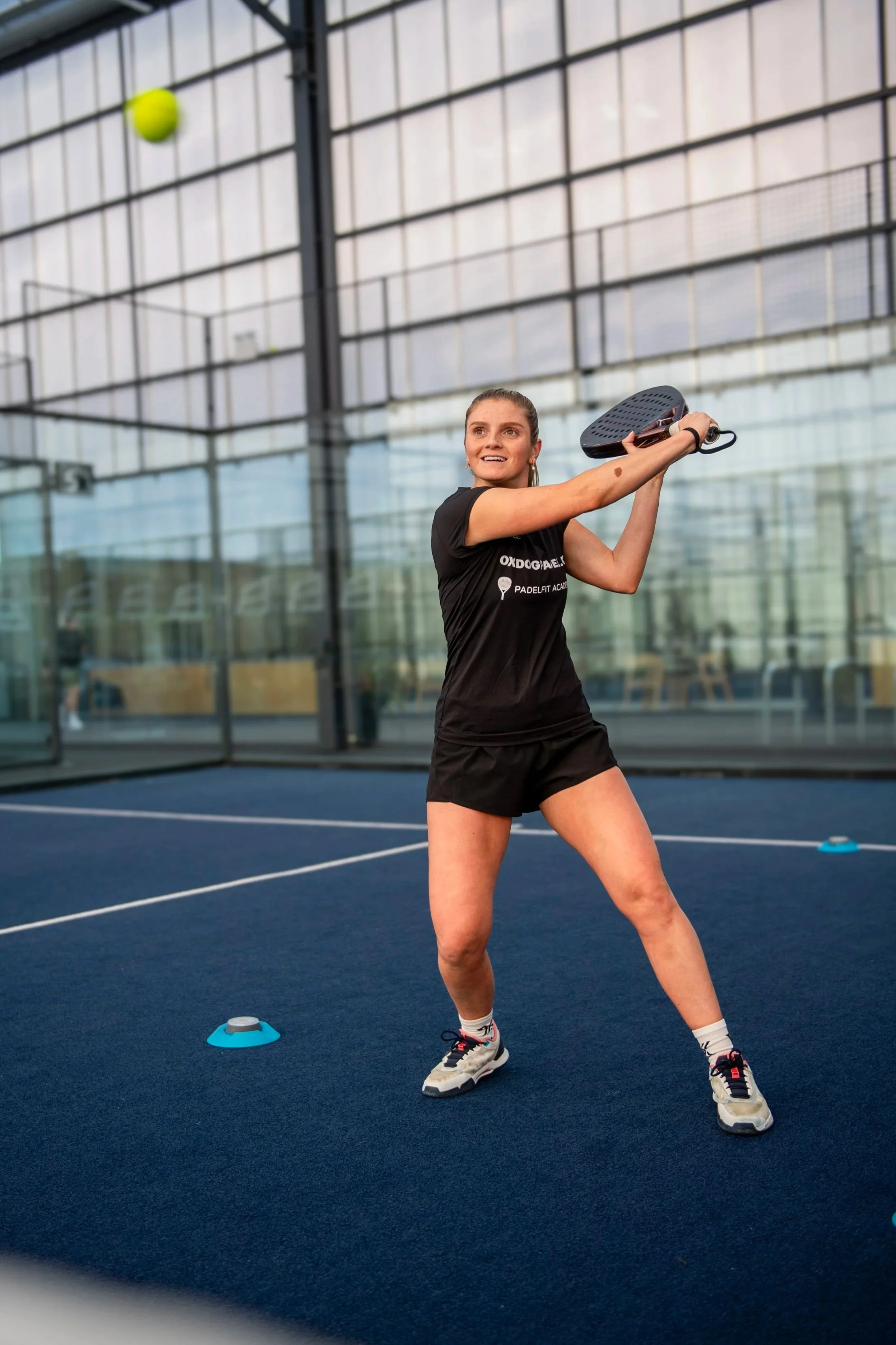 Padelfit Academy Player playing a volley