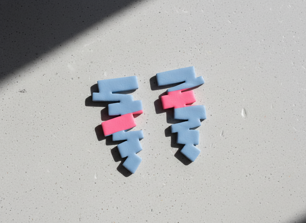 Firefly_Gemini Flash_Abstract editorial product photography. Sculptural statement earrings inspired by mod 194718.png