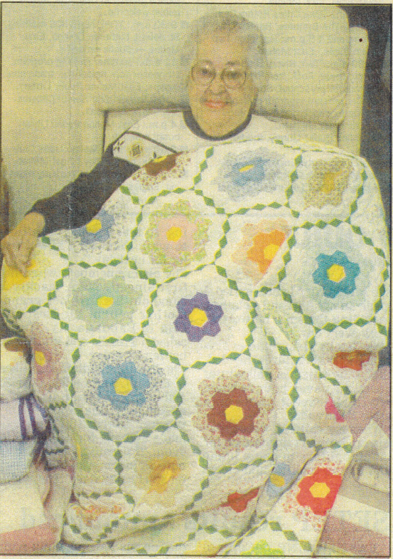 Photo of my Grandma Hicks and one of her Grandmothers Flower Garden Quilts
