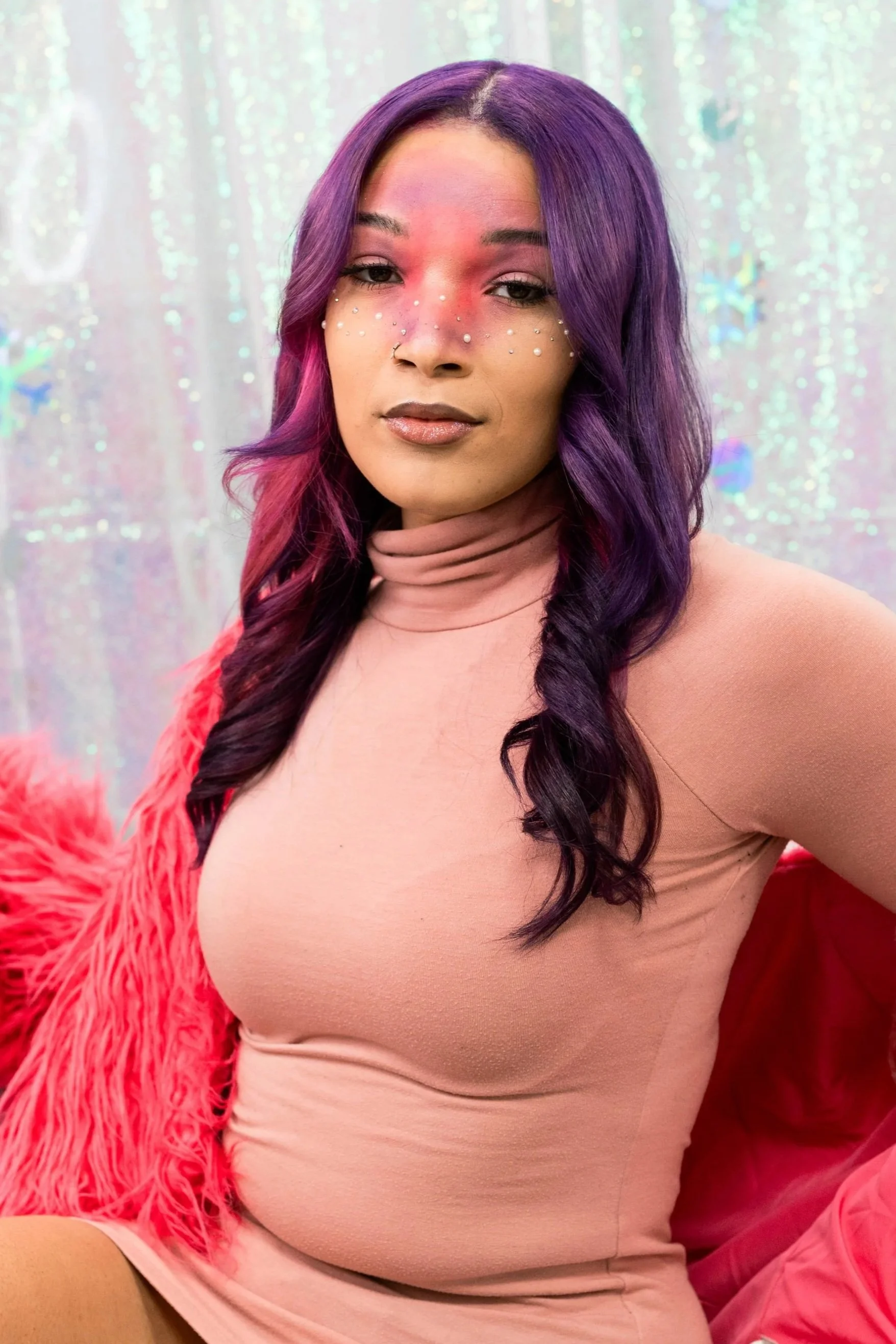 Purple and magenta vivid hair color by Alfa Jae Salon in Cary, NC