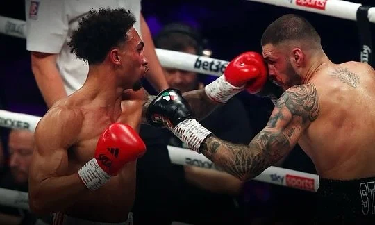 @benwhittaker | Circa 2023
Custom red gloves finished with a metallic black insignia.
Clean placement, no distractions.
Made for the showman.

#ArtOfWarStudio #BenWhittaker #CustomGloves #BoxingGloves #FightGear #BoxingStyle #GloveCustomisation #OneO