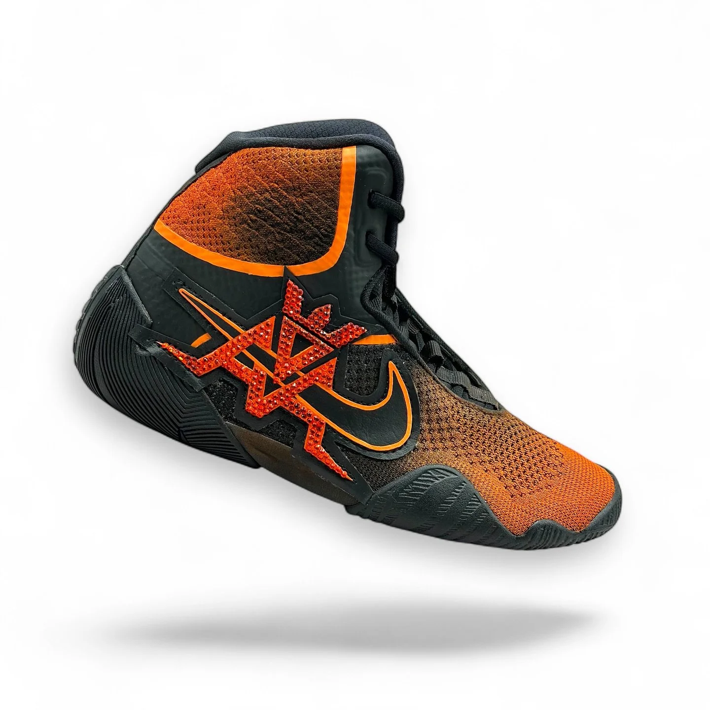 @adam.azim1 | Circa 2023
Nike Wrestling boots airbrushed in a bold orange ombr&eacute;.
Finished with a bespoke hand-crafted insignia, stitched straight into the upper and set with orange crystals.
Clean. Sharp. Built for impact.

#ArtOfWarStudio #Ad