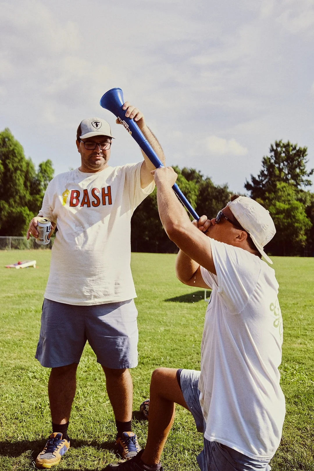 An illustration of a red funnel with tea pouring into it, against a background with geometric shapes and contrasting colors.