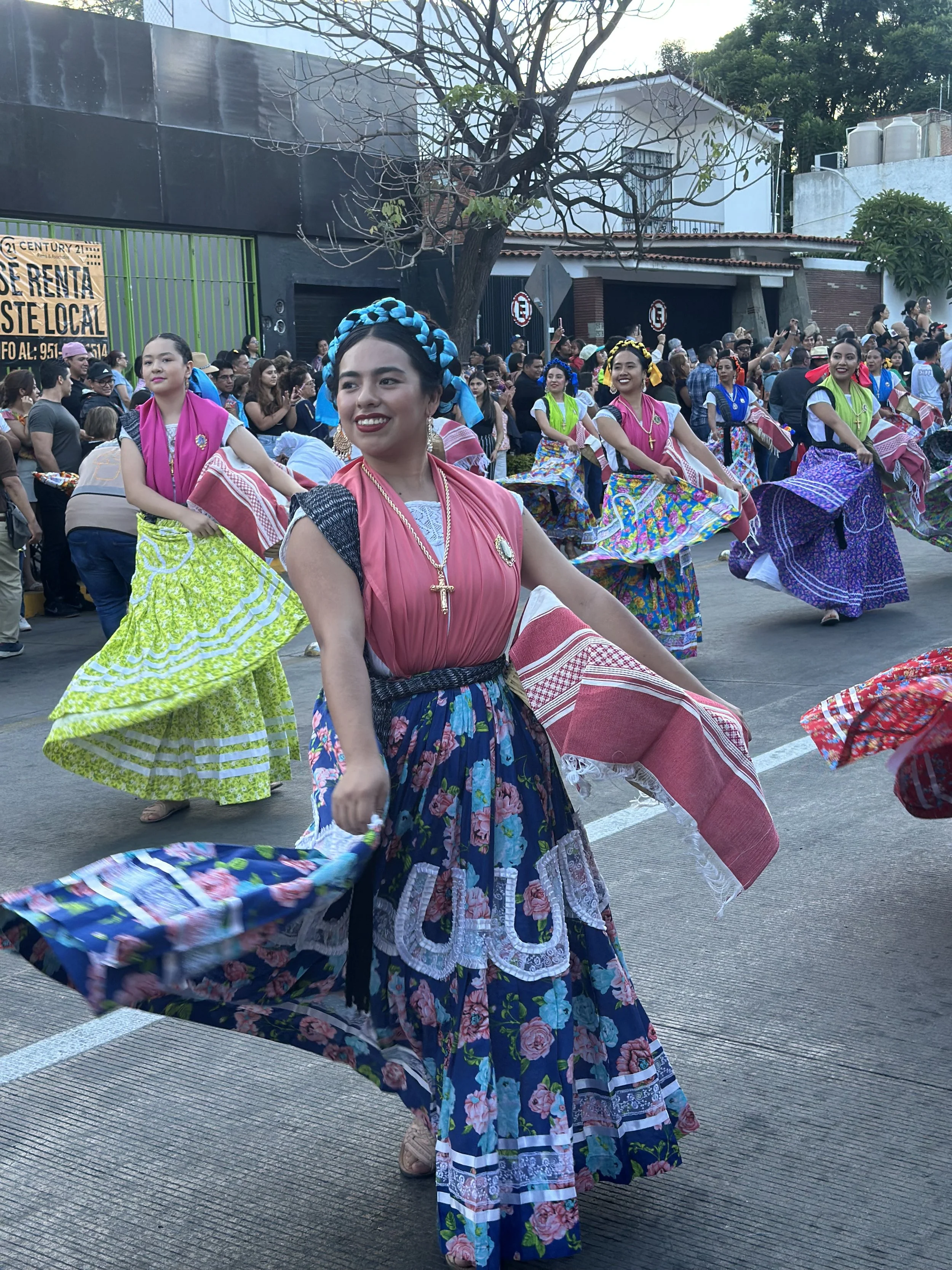 Parade of dancers in the streets of Oaxaca