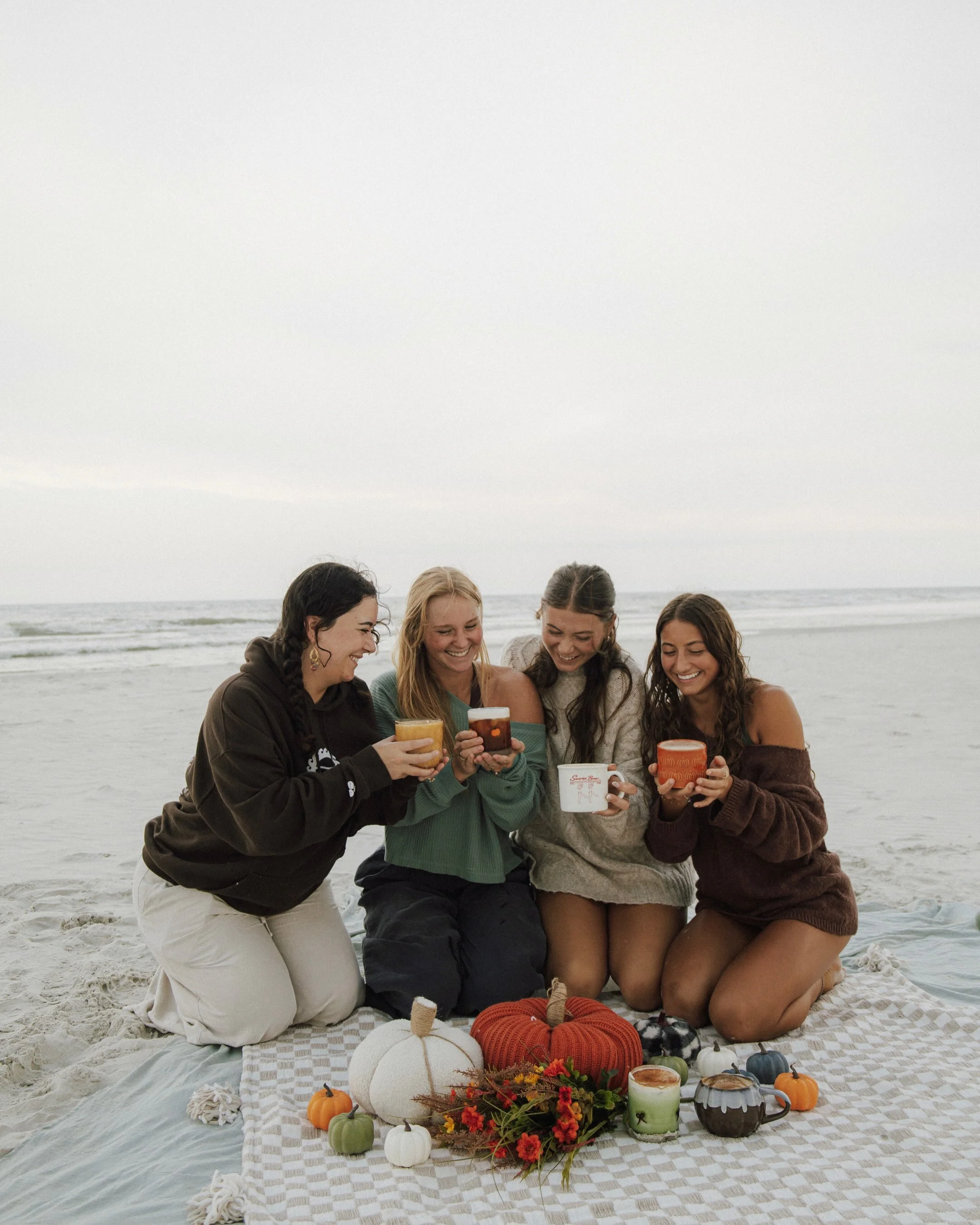 Sunrise Brew food and drinks shared with friends at the beach
