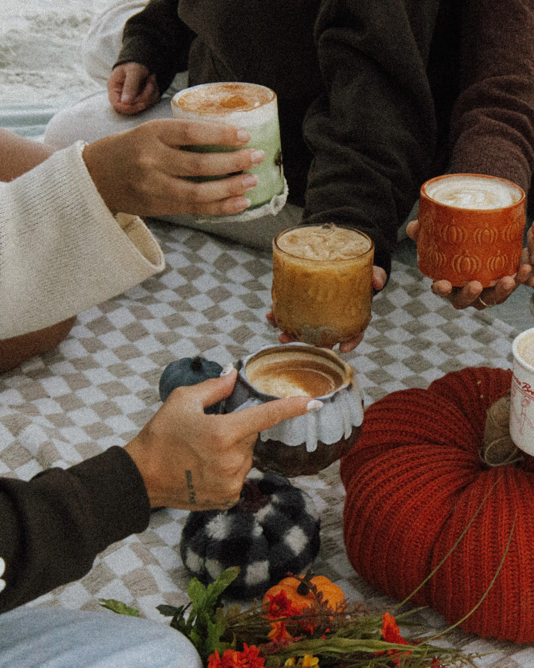 Colorful Sunrise Brew specialty drinks shared with friends