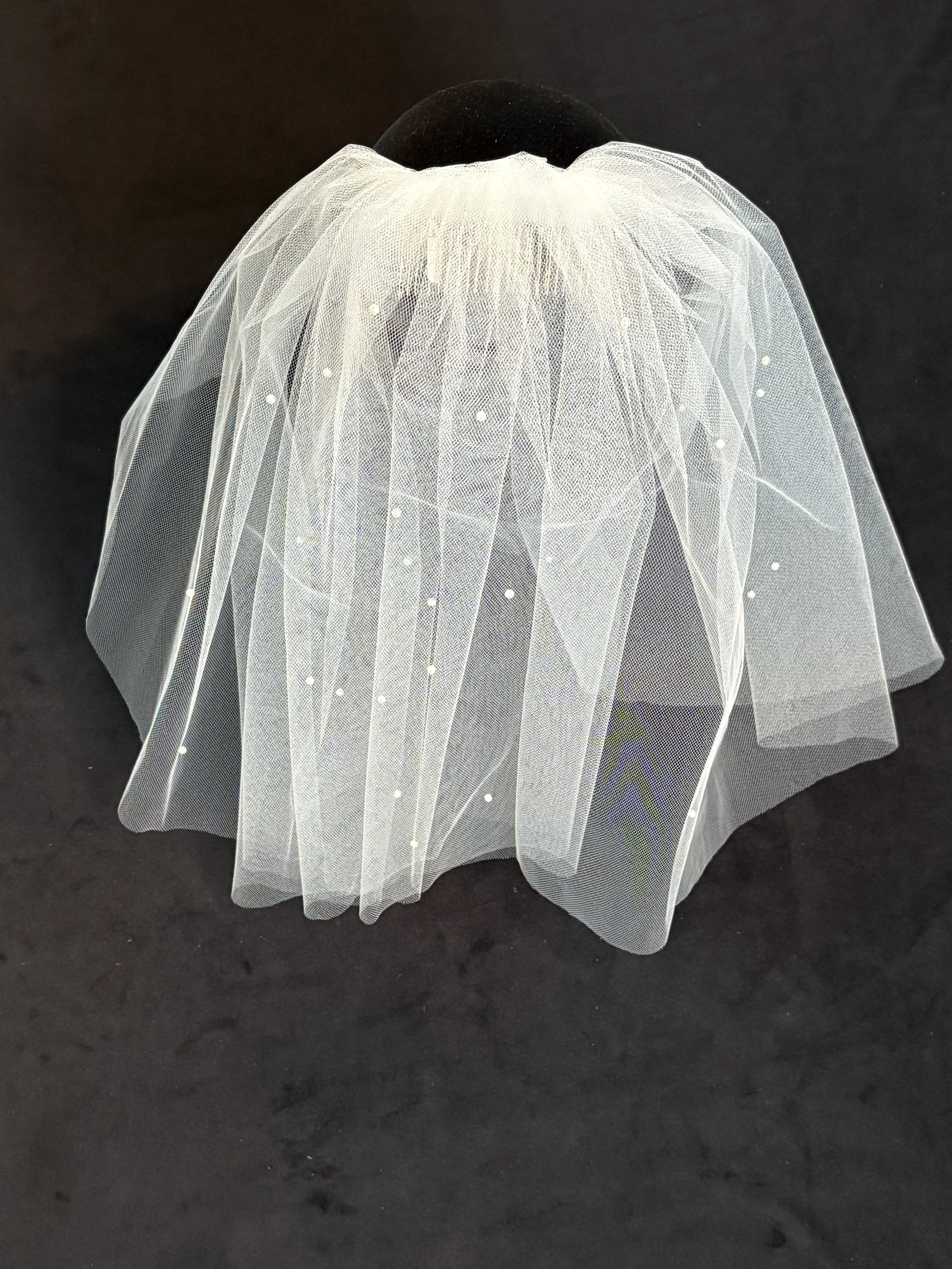 Scattered Pearls on Comb
$55