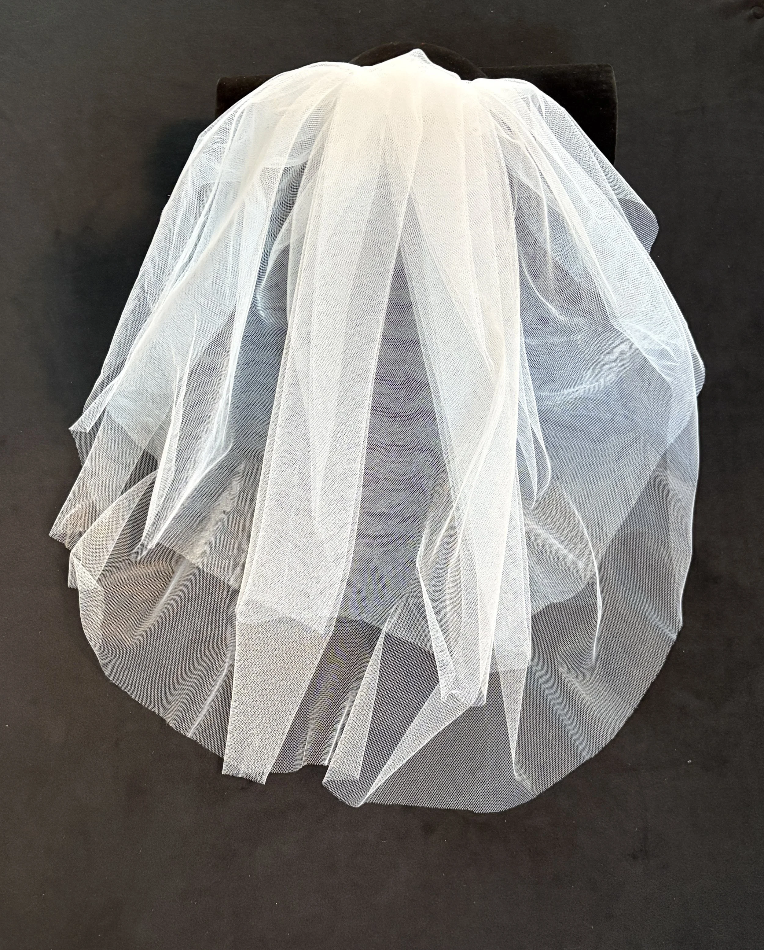 Two Tier Raw Edge on Comb
$45