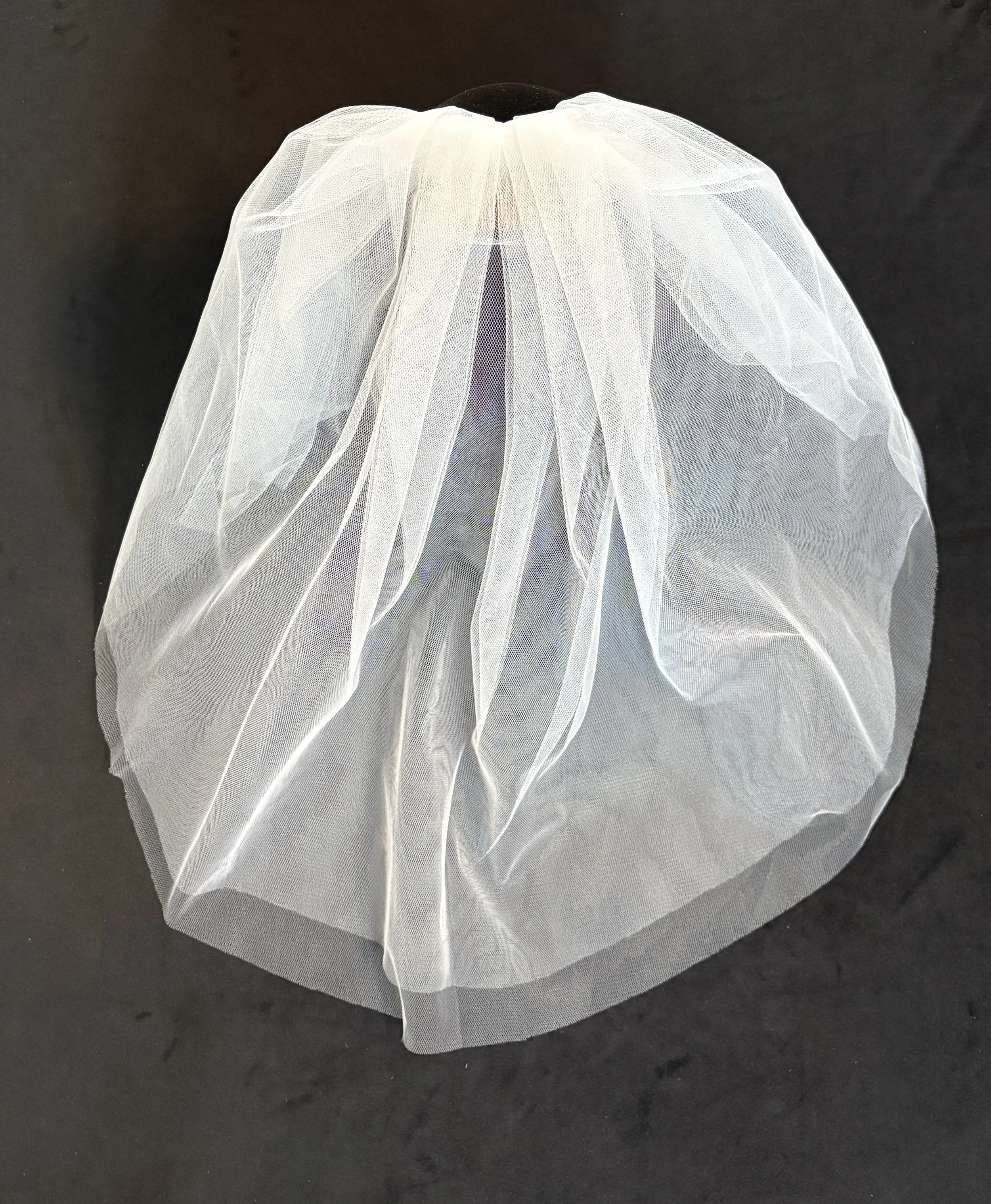 Two Tier Raw Edge on Comb
$45