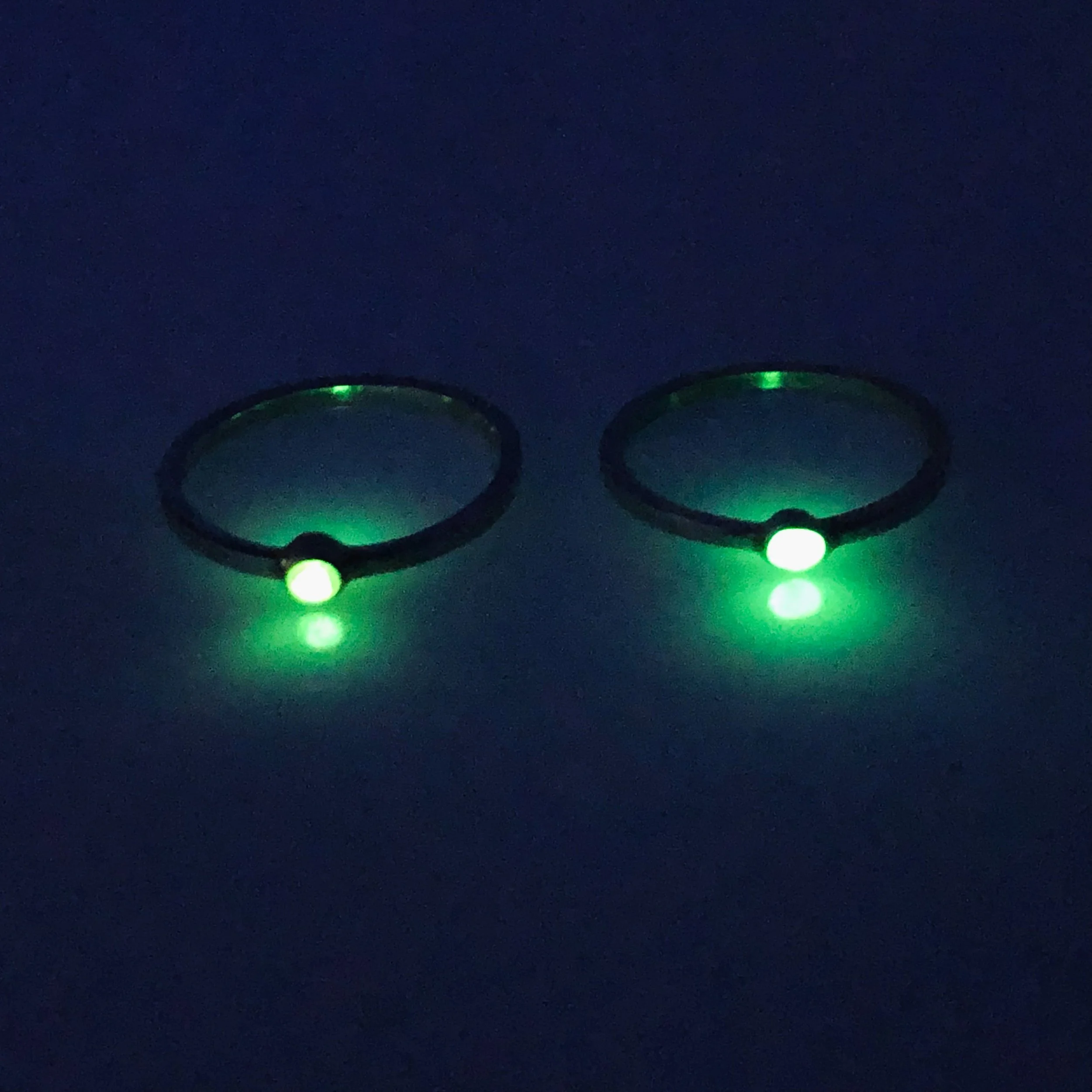 Uranium Glass Rings laying 2.jpg