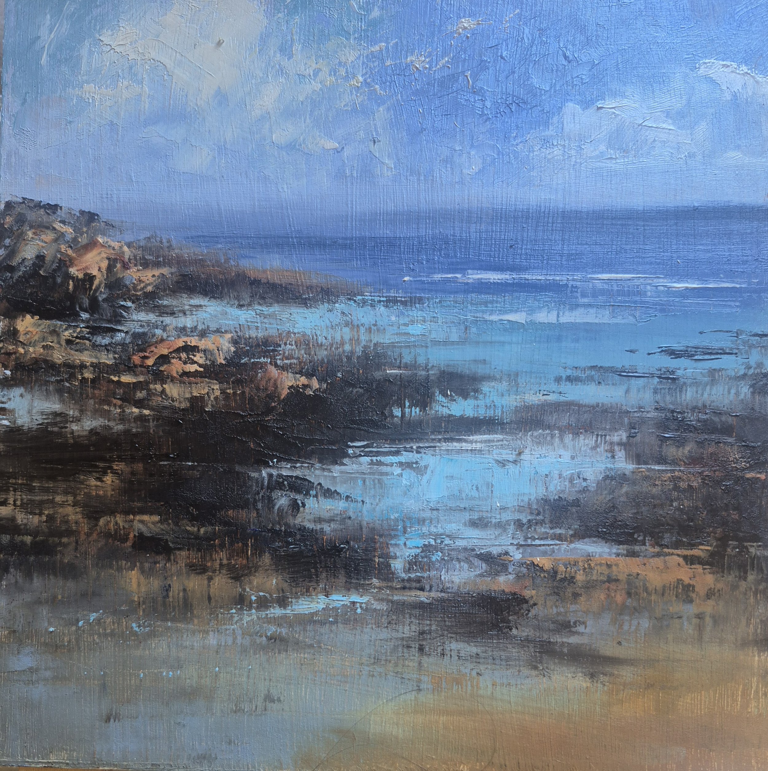 Framed oil painting on panel off the Wild Atlantic Coast of Co. Mayo. Image measures 20x20cm and framed dimensions are 25x25cm. A lovely capture of the light hitting the craggy rocks on a calm day.