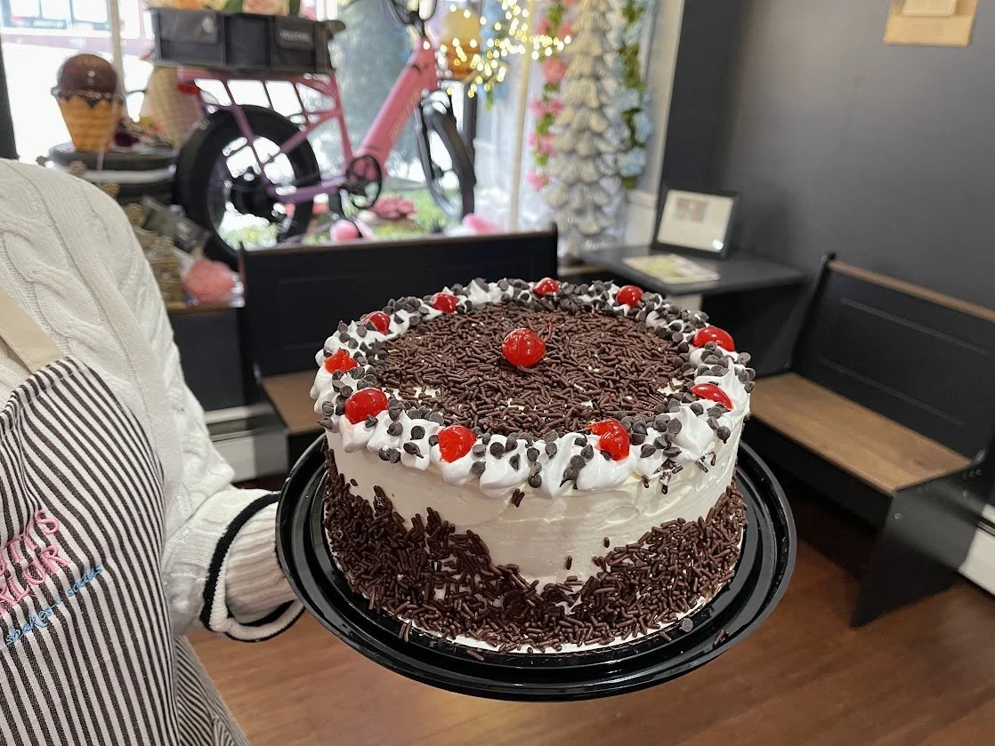 8" cake with cherries and chocolate sprinkles