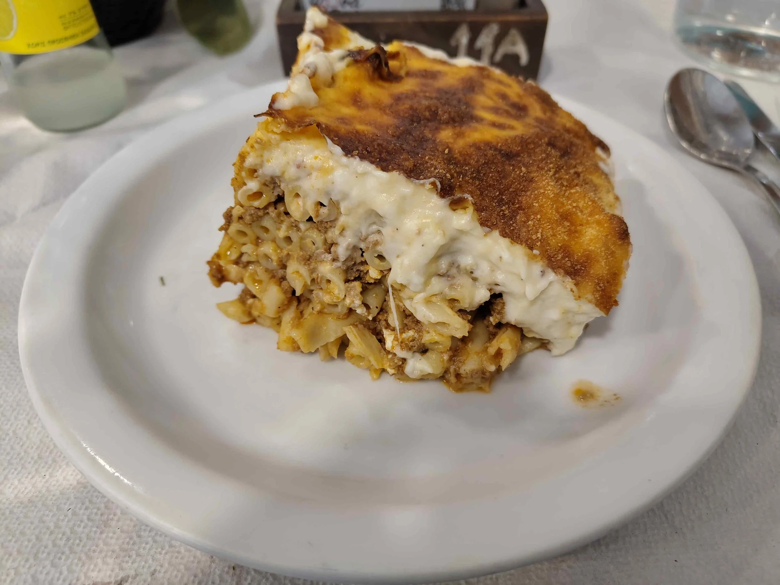 Pastitsio – traditional Greek baked pasta with minced meat and béchamel sauce