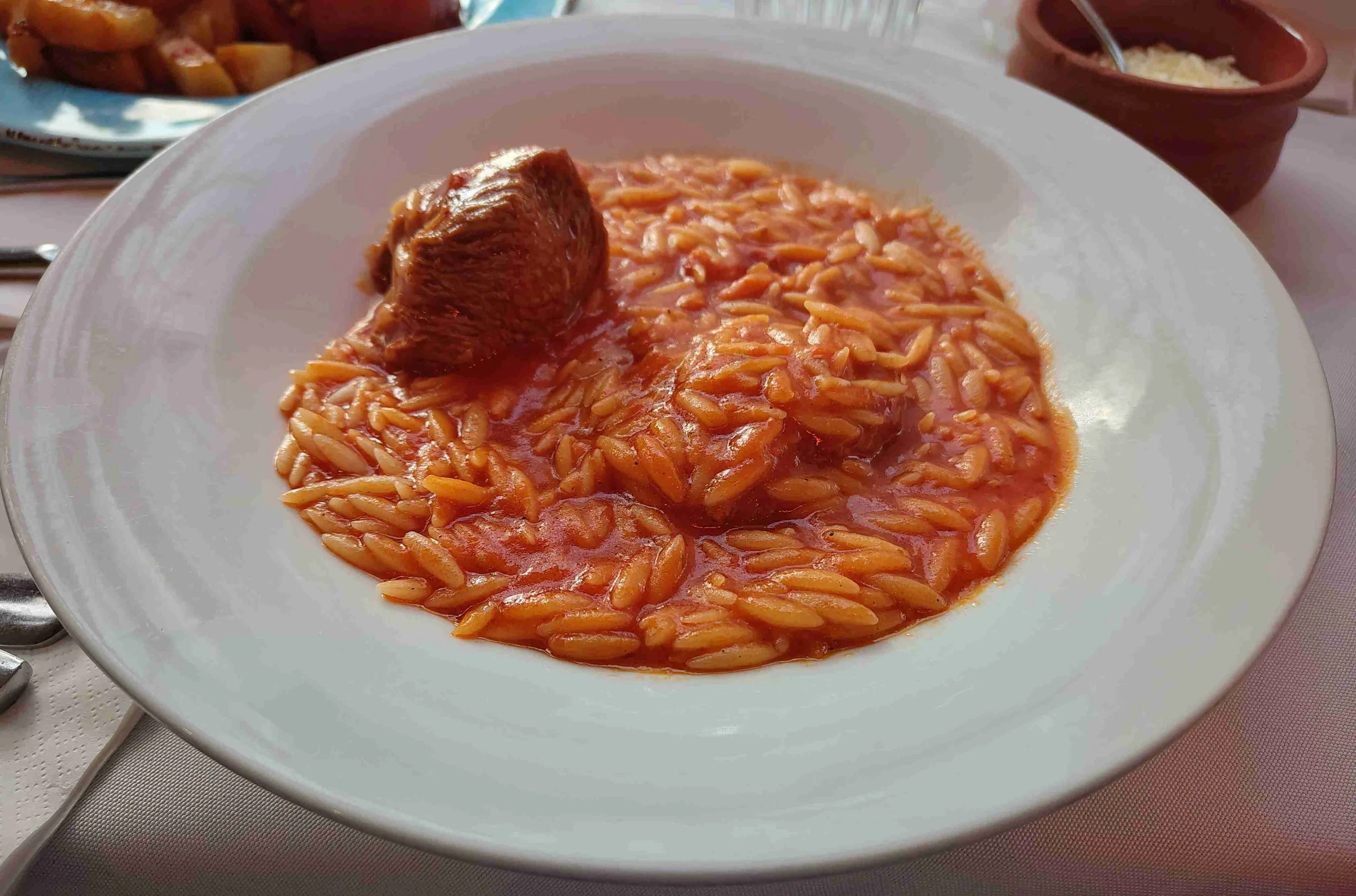 Giouvetsi – traditional Greek baked orzo pasta with slow cooked beef in tomato sauce