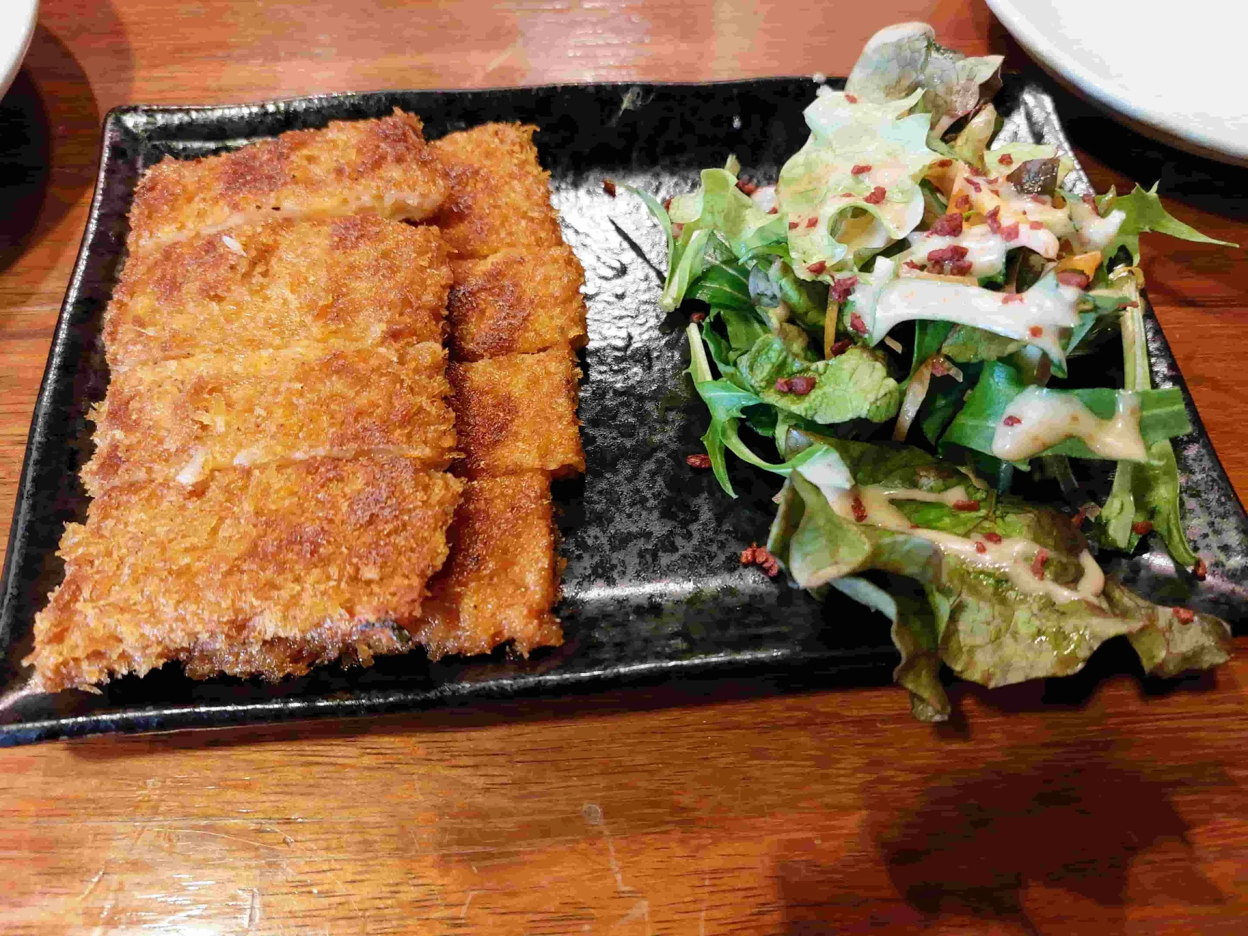 Hiroshima-style gansu – crispy, deep-fried fish cake with spicy seasoning, served hot as a savoury snack or side dish.