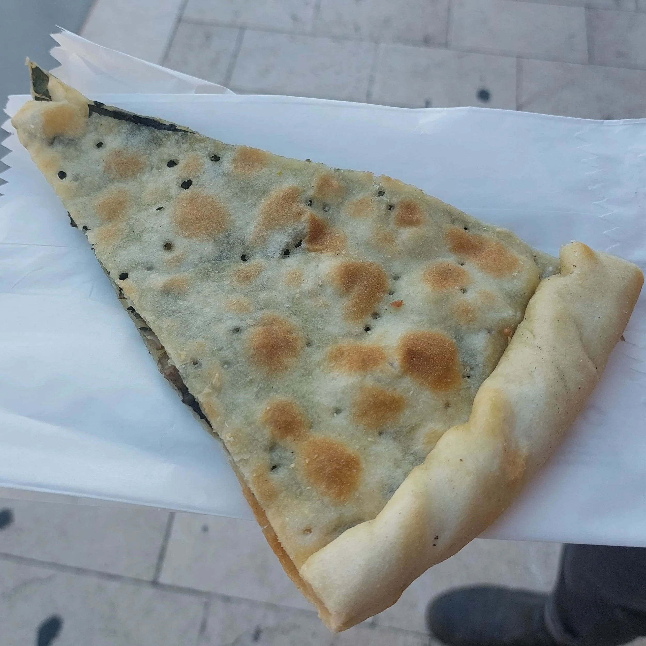 slice of soparnik, traditional Croatian Swiss chard pie