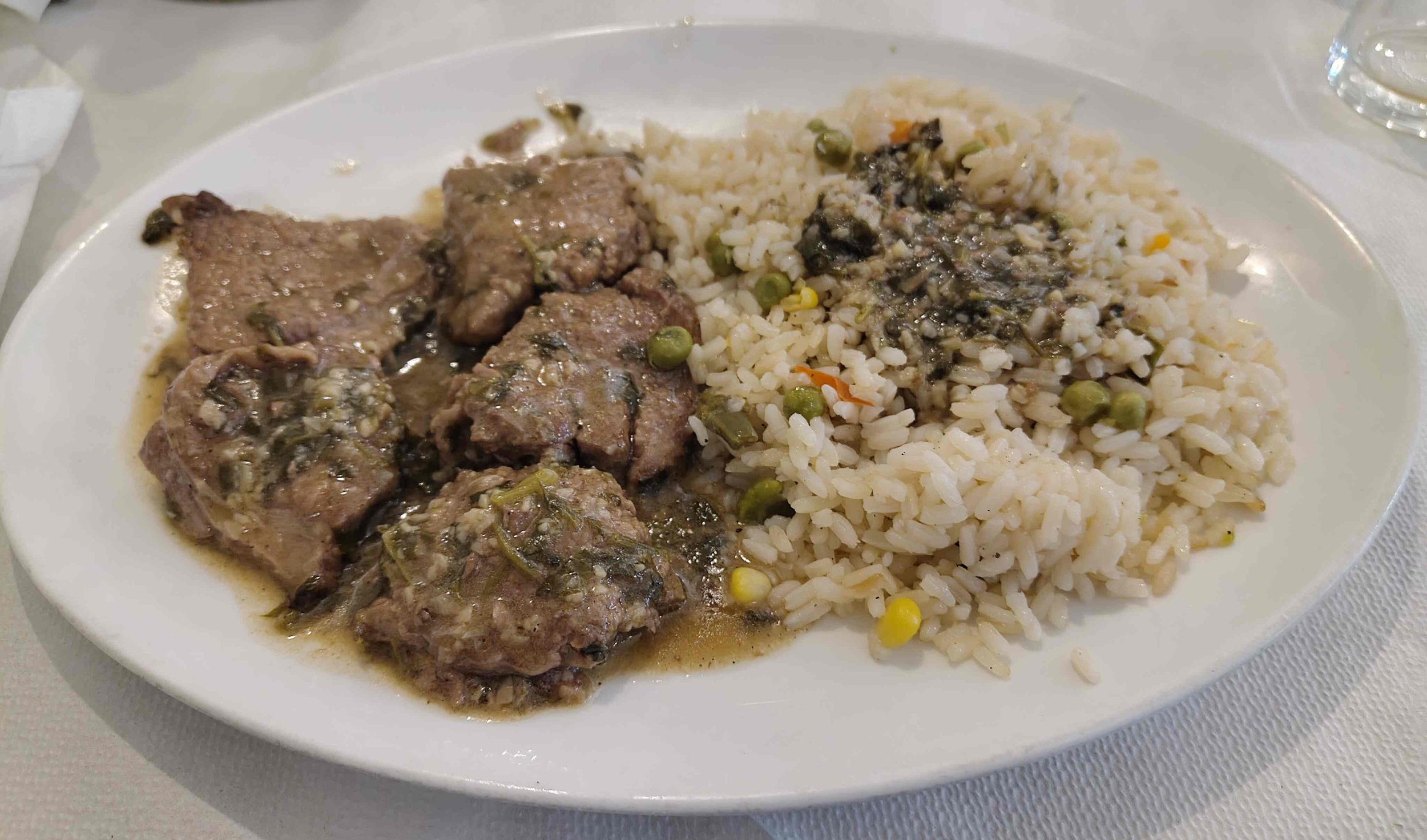 Sofrito – traditional Corfiot beef dish in garlic and white wine sauce served with rice