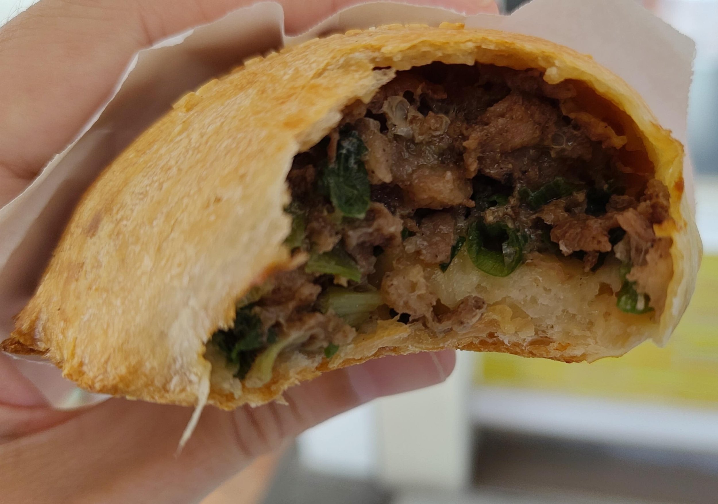 Taiwanese pepper buns, baked buns stuffed with pork, black pepper, and spring onions